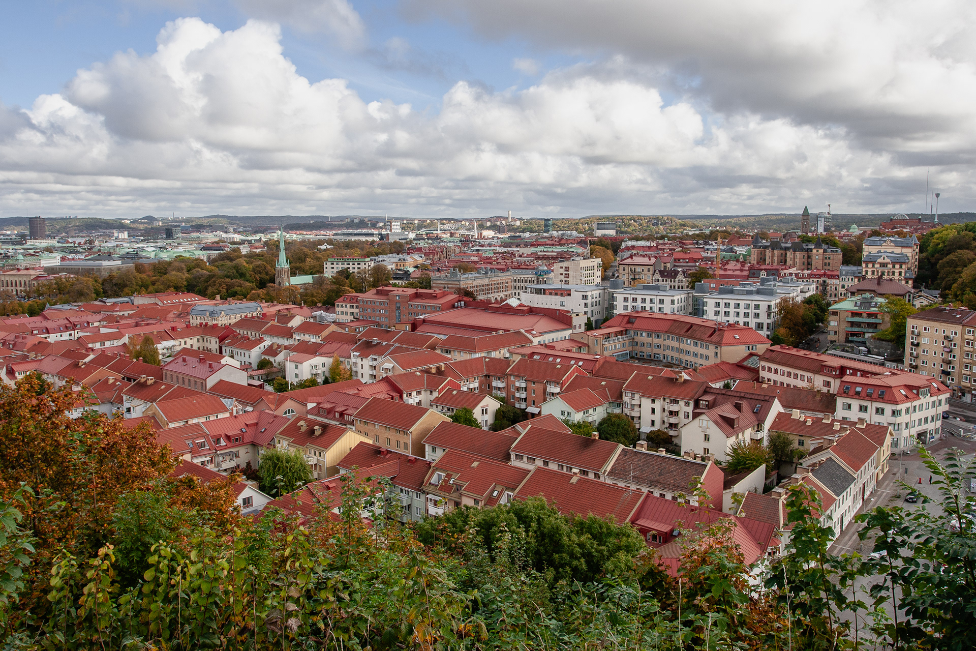 View over Haga and more of Gothenburg from the hill of Skansen Kronan, October 2012. On the far right the Liseberg tower in the amusement park. In the centre near the horizon the Ullevi football stadium.