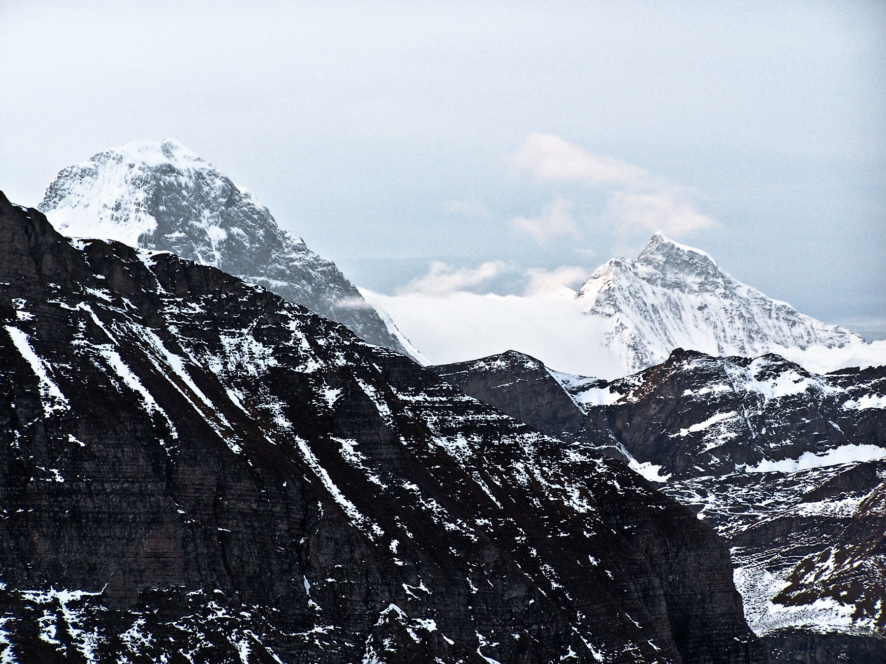 View from the mountains around the village Axalp. Snoyw mountains are the Eiger and the Jungfrau.