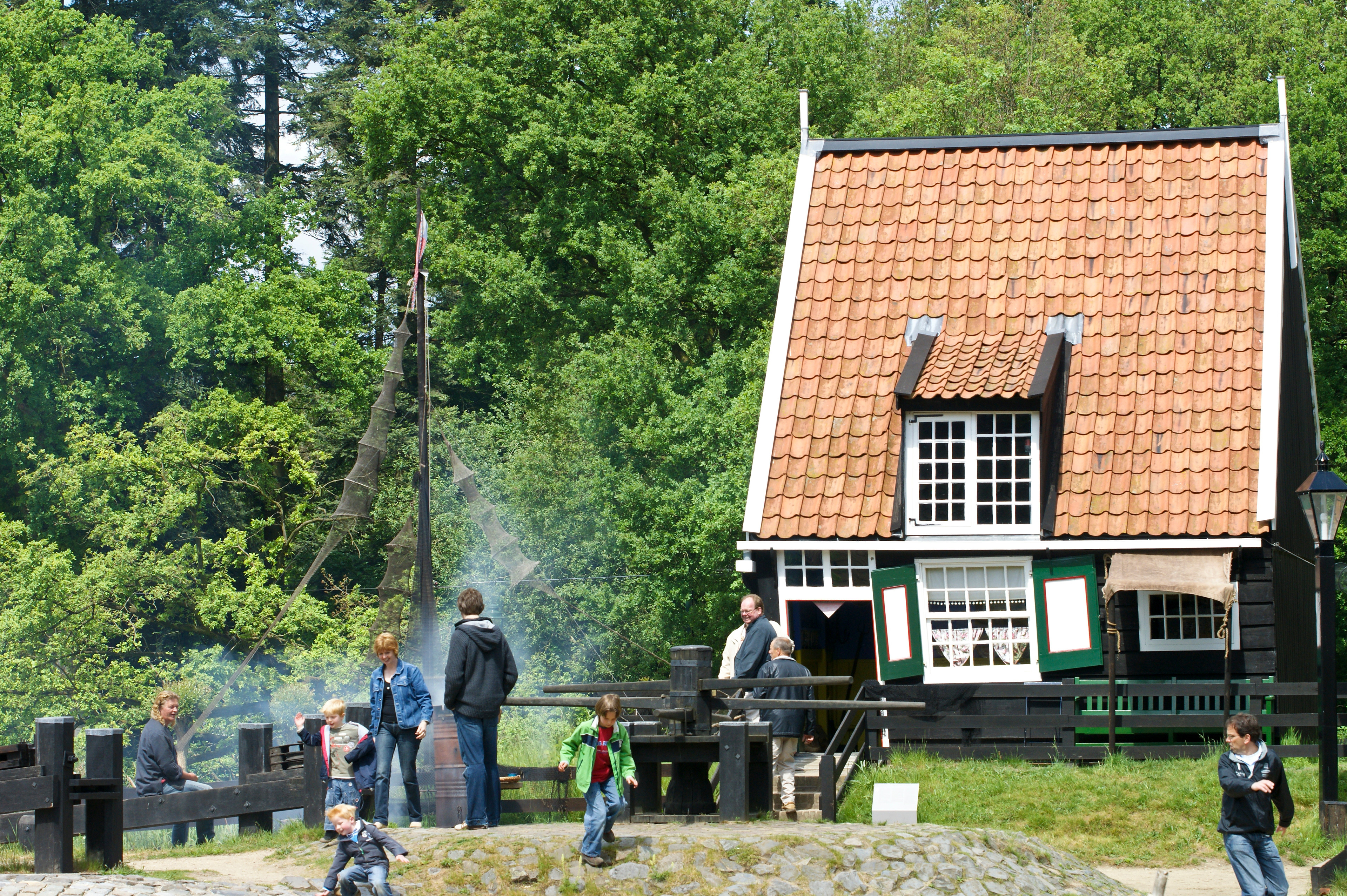 Historic building in the Netherlands open air msuem and people enjoying themselves, May 2008