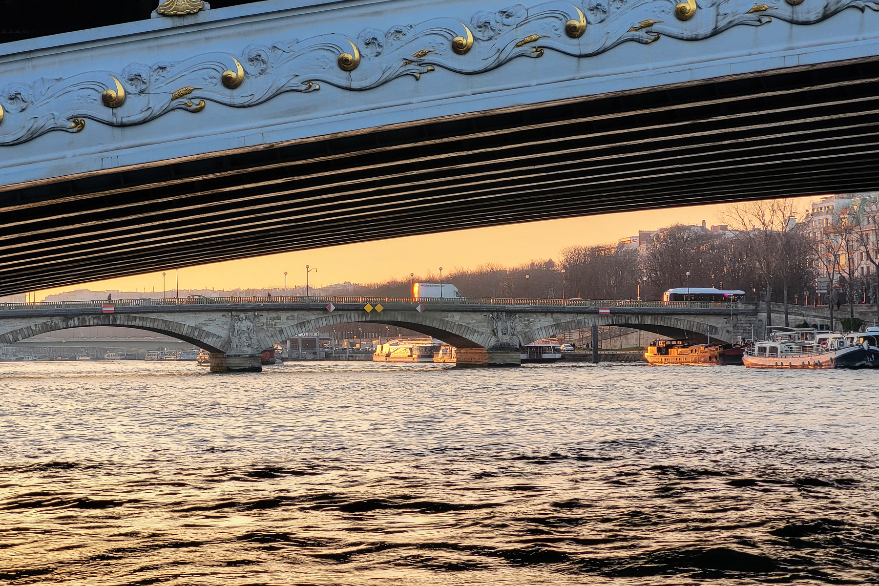 Sunset underneath Pont des Invalides, March 2023.