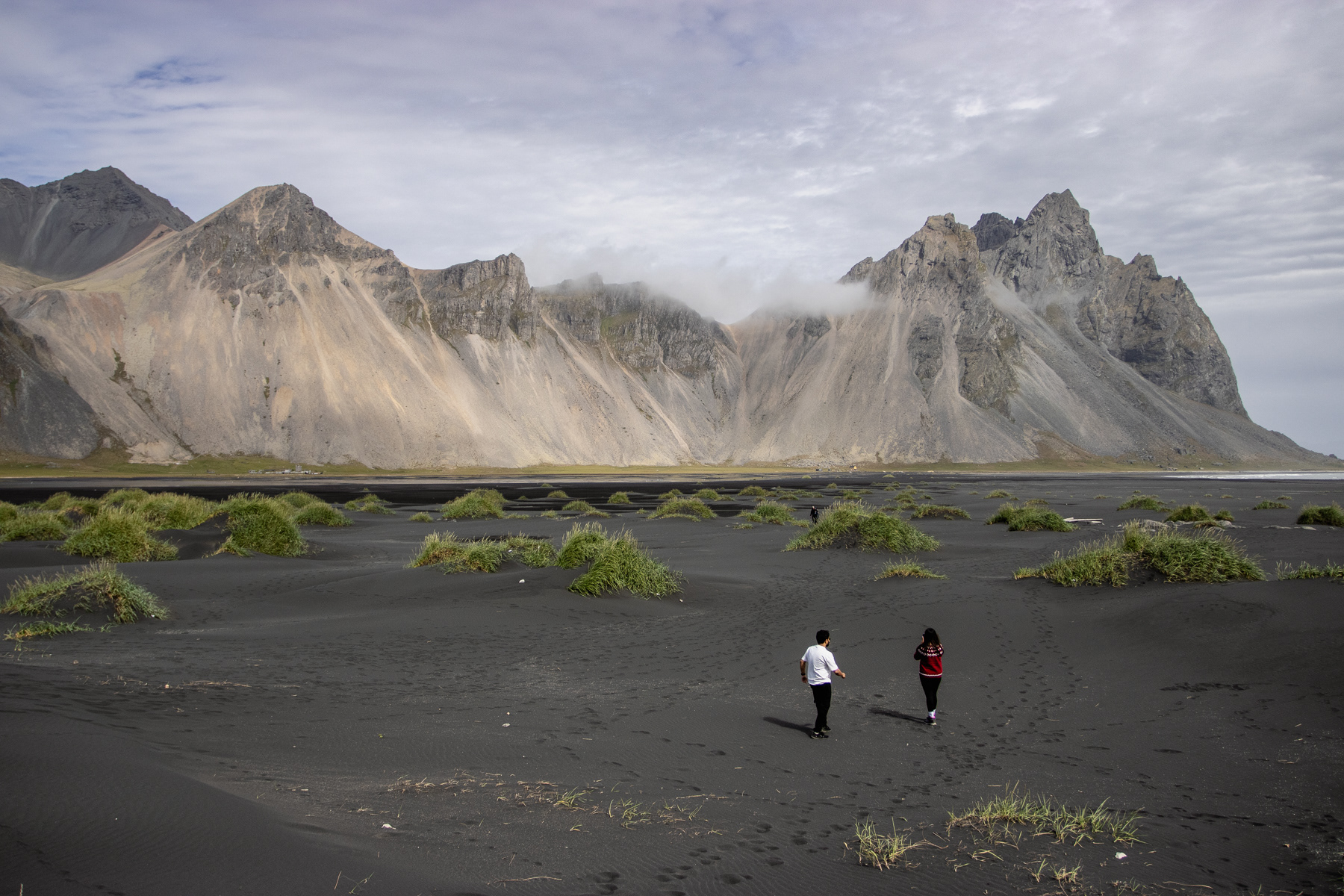 A black sand beach and the Vesturhorn mountains.