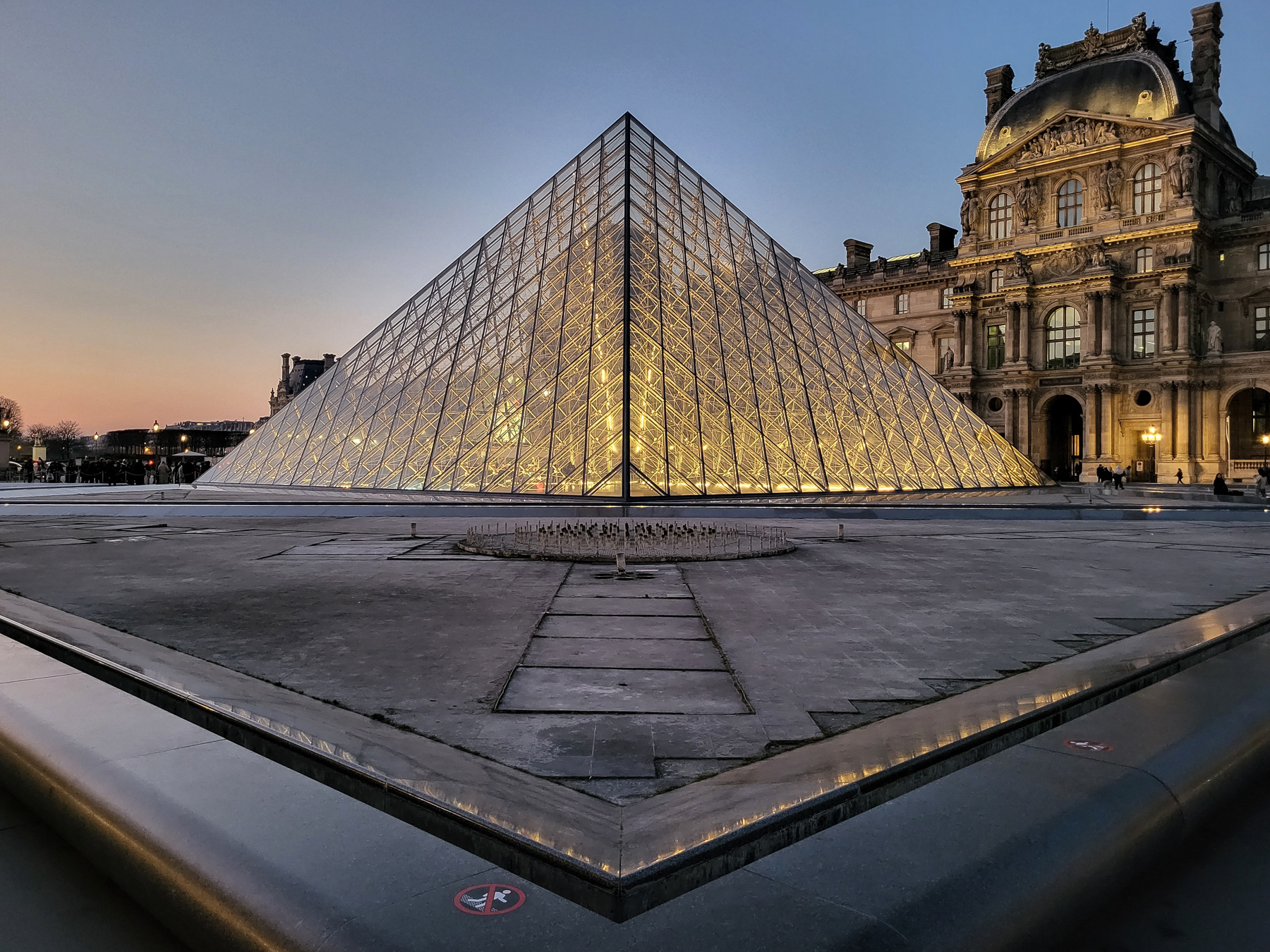 Musée du Louvre and its glass pyramid, March 2023.