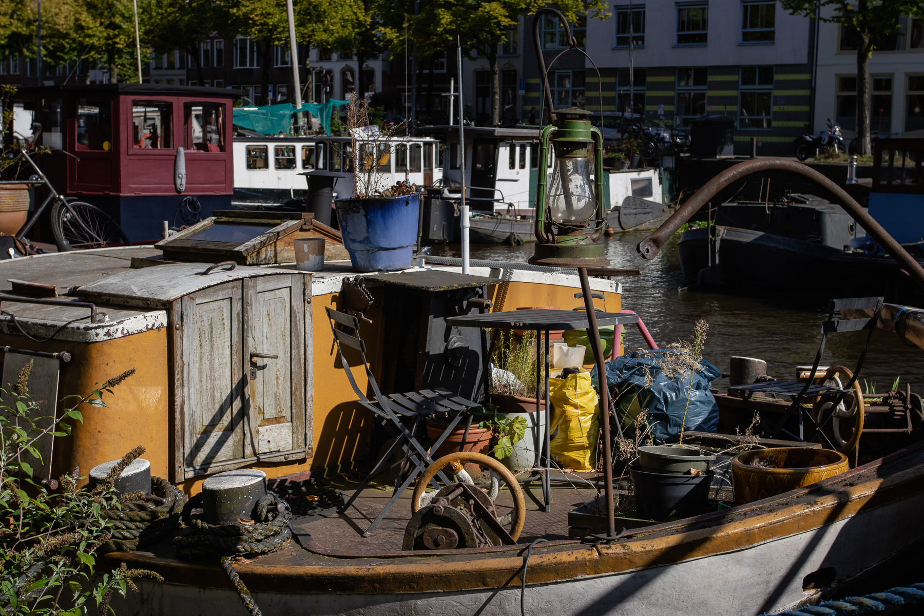 On the deck of a boat in the canal