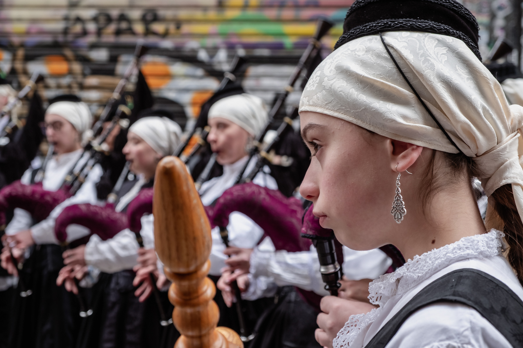 Close up of a young female band member.