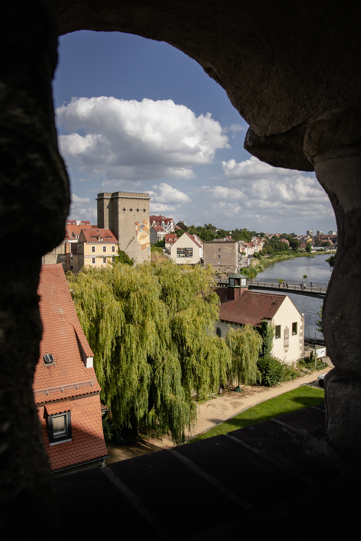 View at the Polish side through a opening in the wall in Görlitz