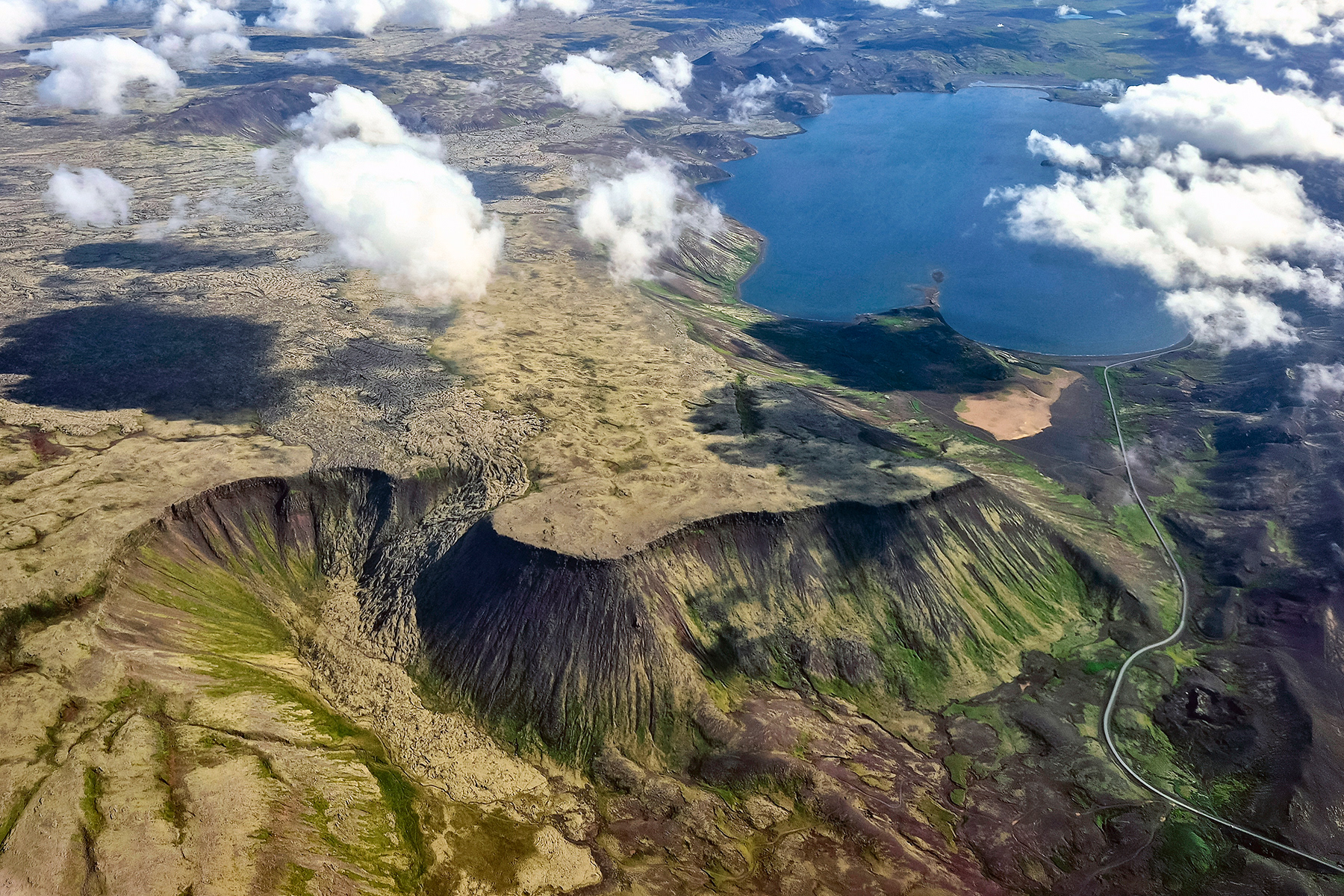 Dramatic landscape of the Reykjanes Peninsula of Iceland (Suðurnes). This is just north of lake Kleifarvatn in the larger Grindavik area. Road 42 is clearly visible. July 2025.