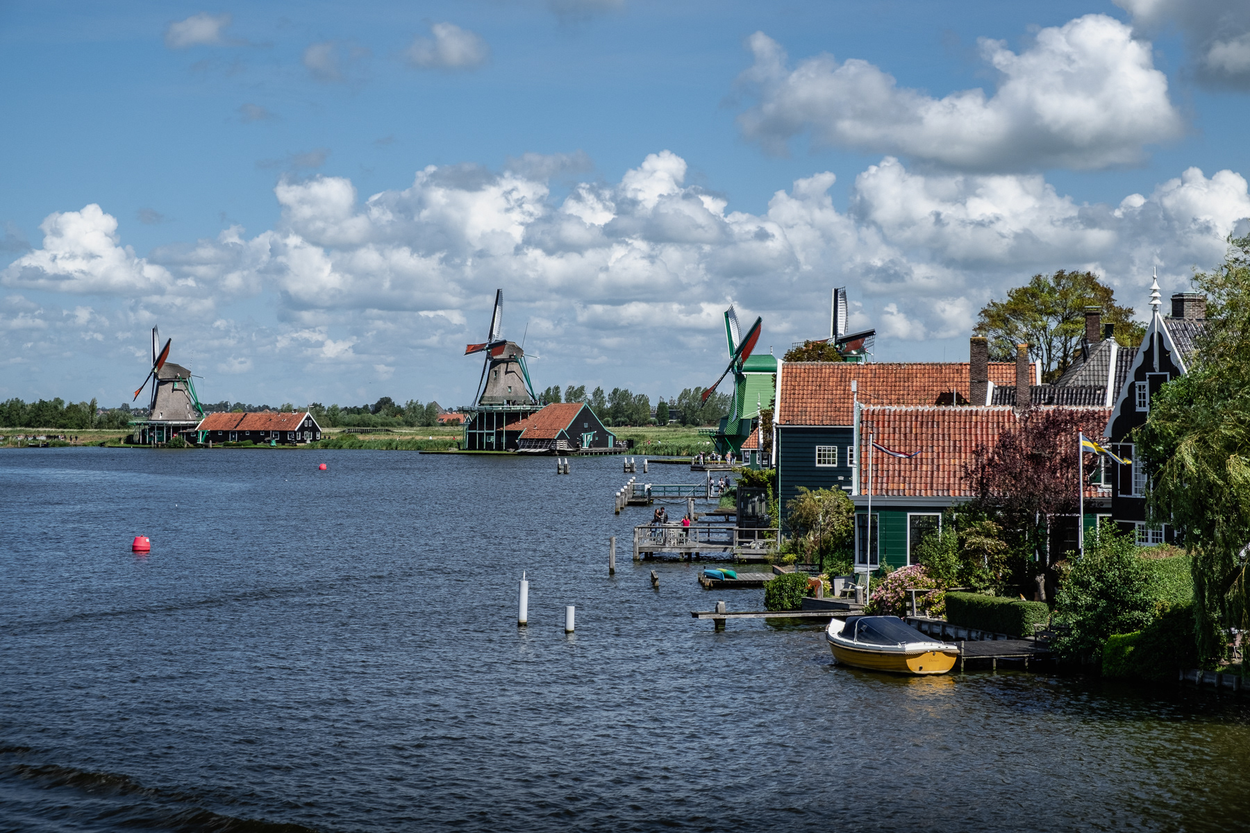 Line up of the historic mills at Zaanse Schans open air museum, August 2023.