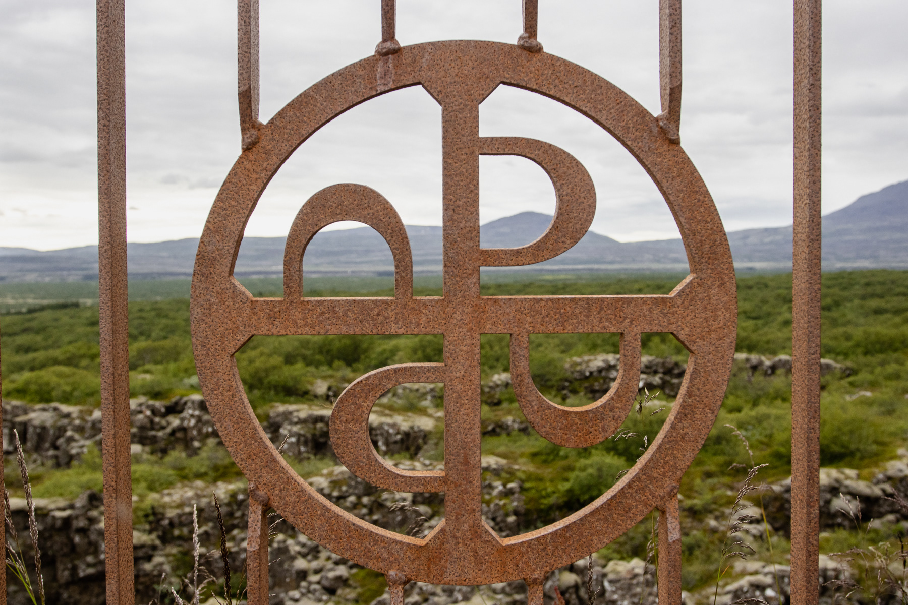 Logo and view of Thingvellir National Park