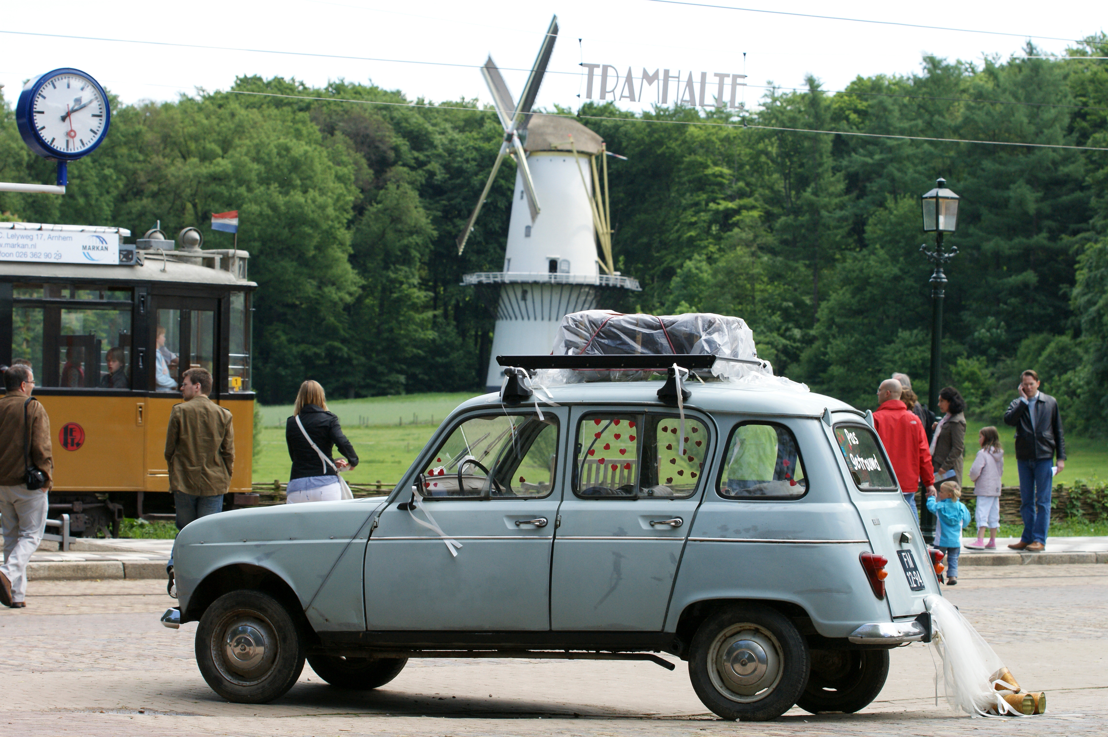 Mill, French car "just married" and a historic tram in the Netherlands Open Air Museum, May 2008