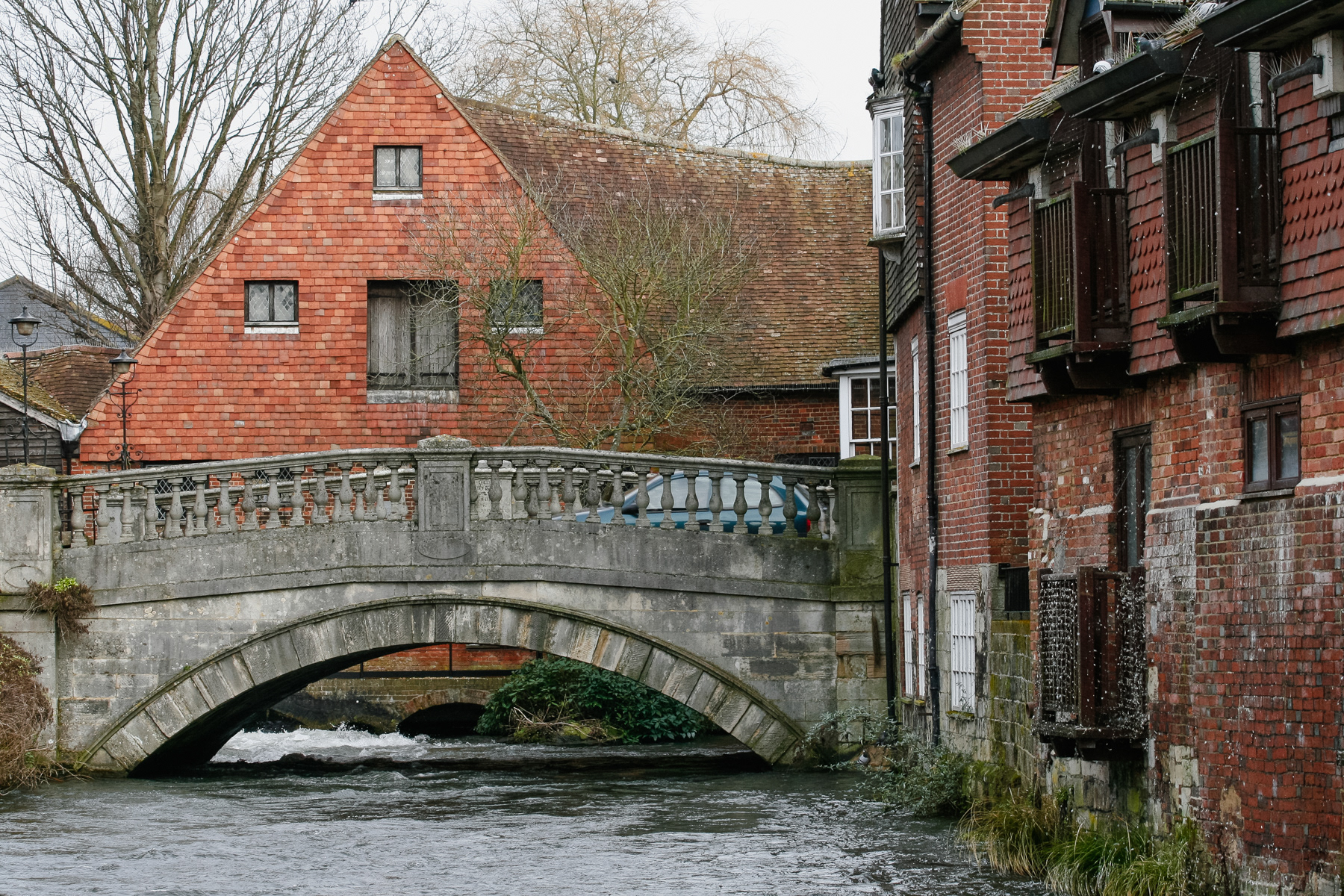 At The Weirs with the Winchester City Mill on the other side of the bridge.
