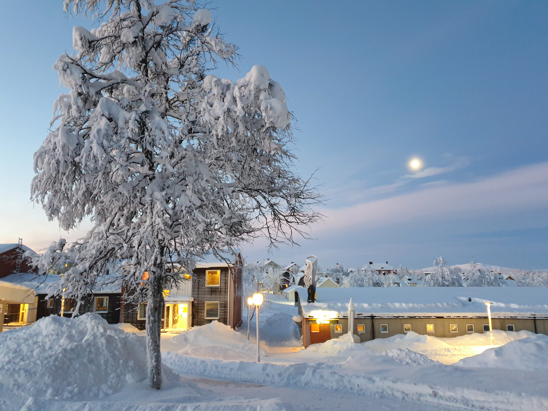 Sunrise and moonshine in Kiruna town.