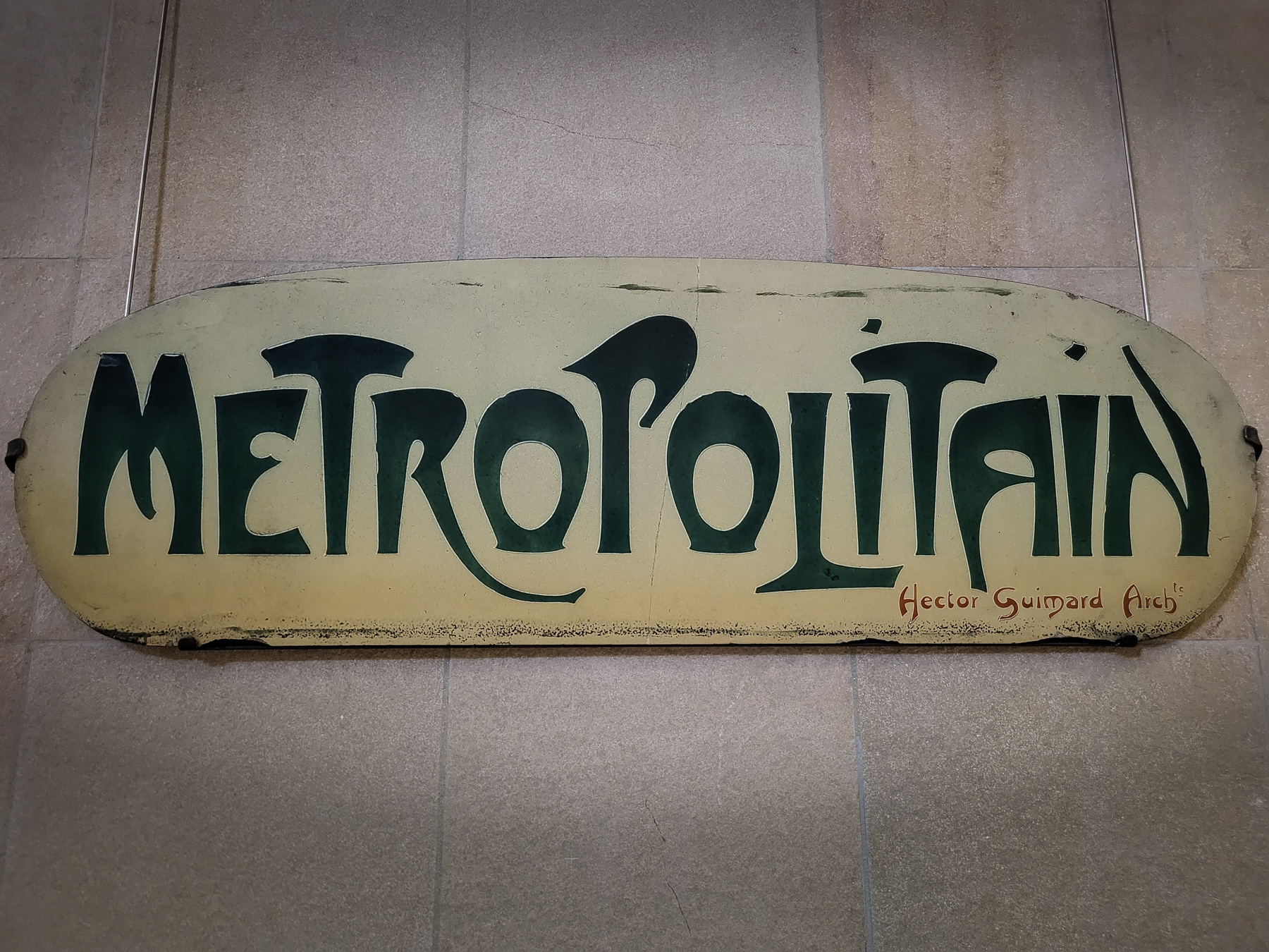 The famous Metropolitain sign by Hector Guimard Arch inside the Musée d'Orsay, March 2023.