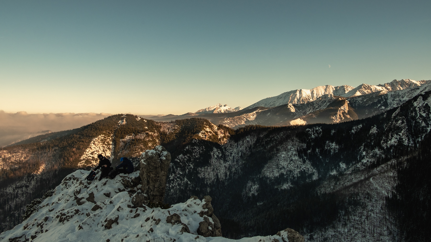 View at the eastern Tatras partly covered in snow from the hiike up to the Sarnia Skała peak
