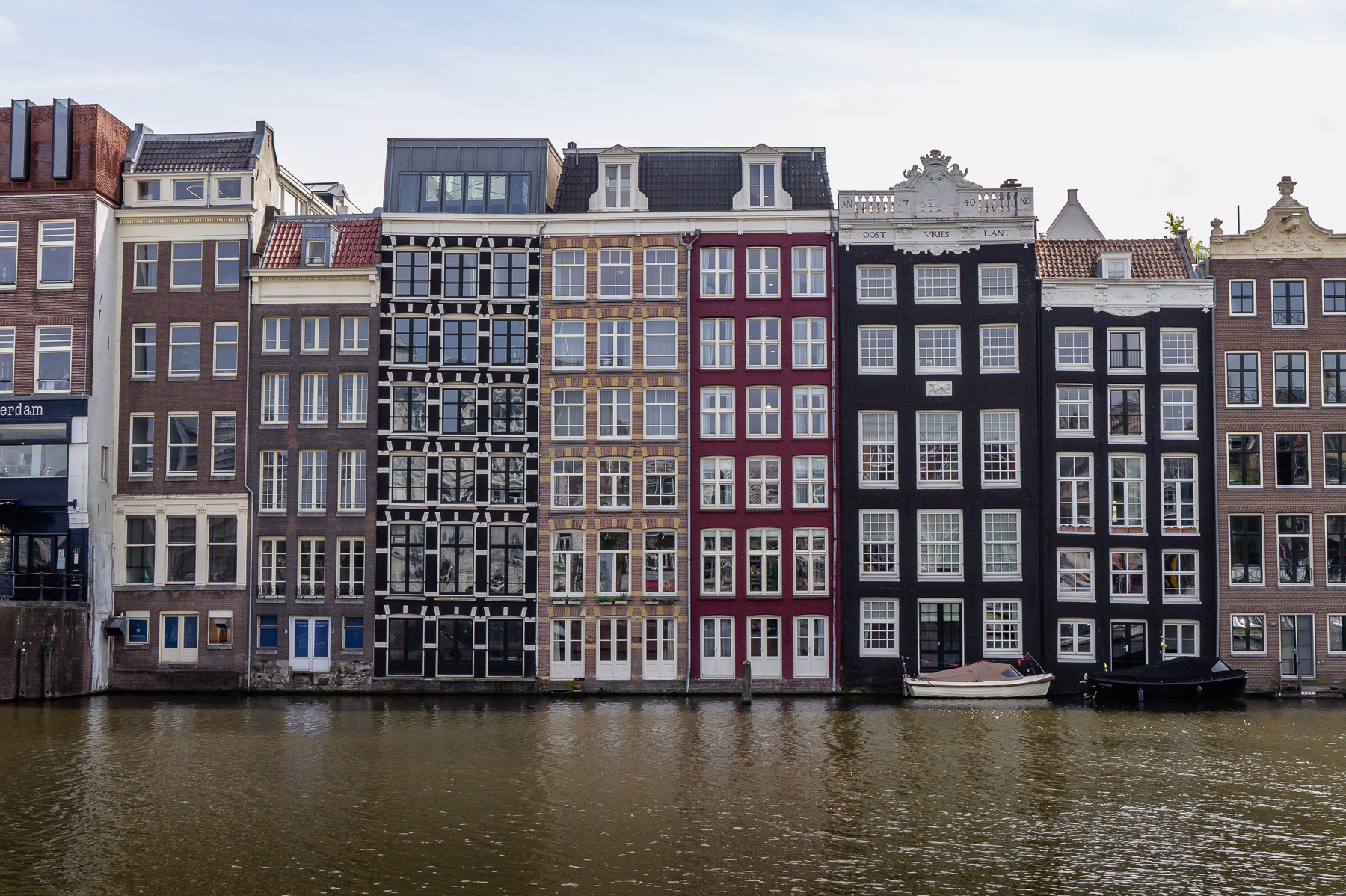 Damrak and typical Amsterdam facades near Central Station, May 2025