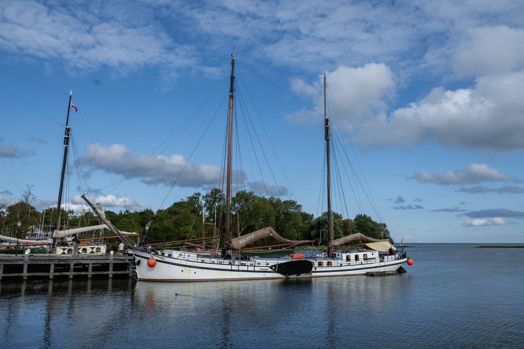 A two-mast sailing boat in the Hoorn harbour, August 2023.