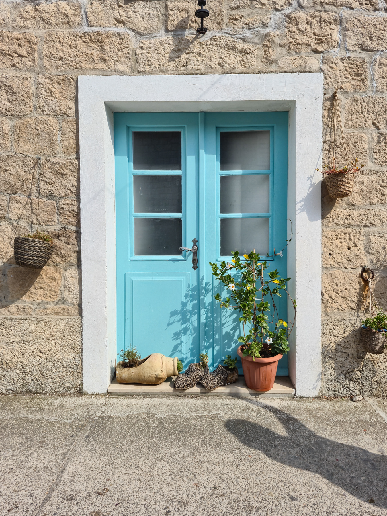 Triptych of the blue door and windows.