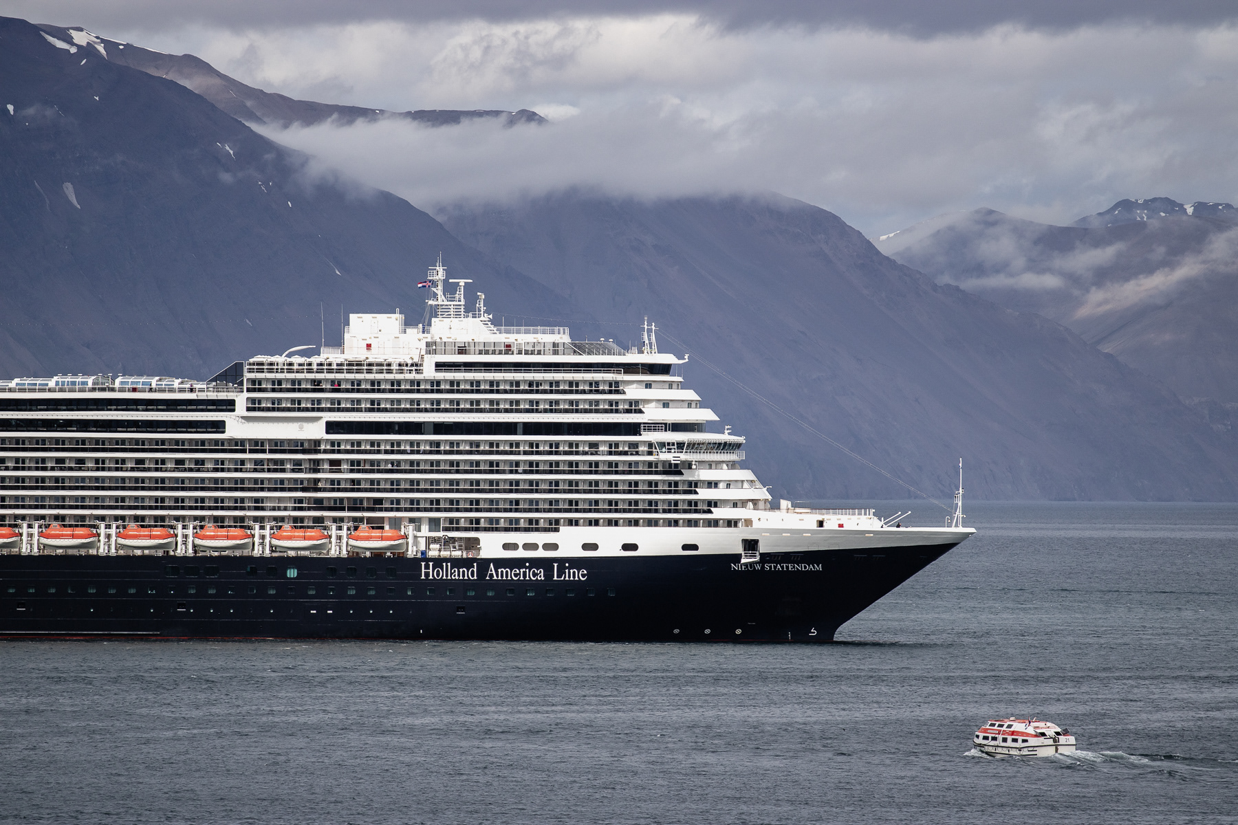 The Holland America Line cruise ship Nieuw Statendam anchored just outside the harbour of Húsavík, July 2025.