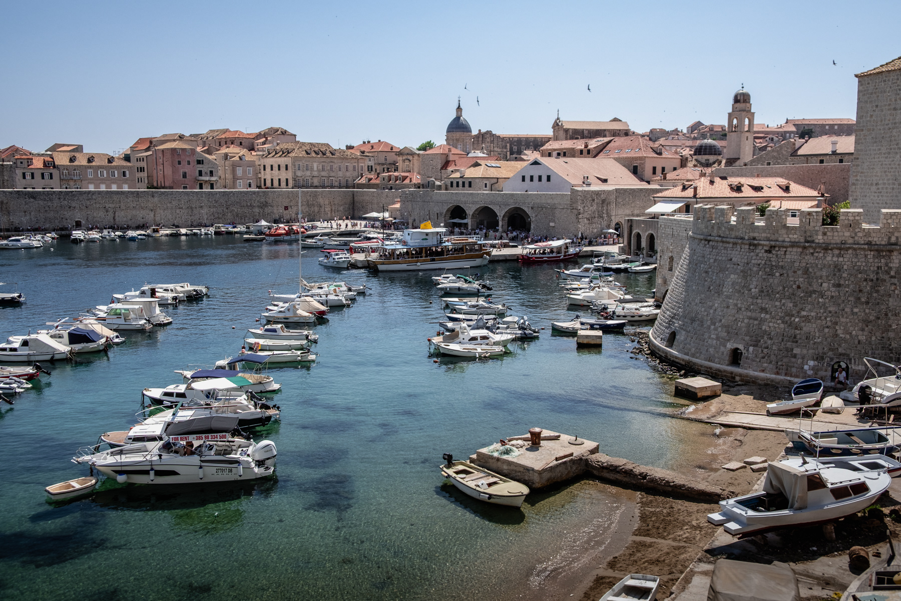 The old town harbour of Dubrovnik, July 2023.