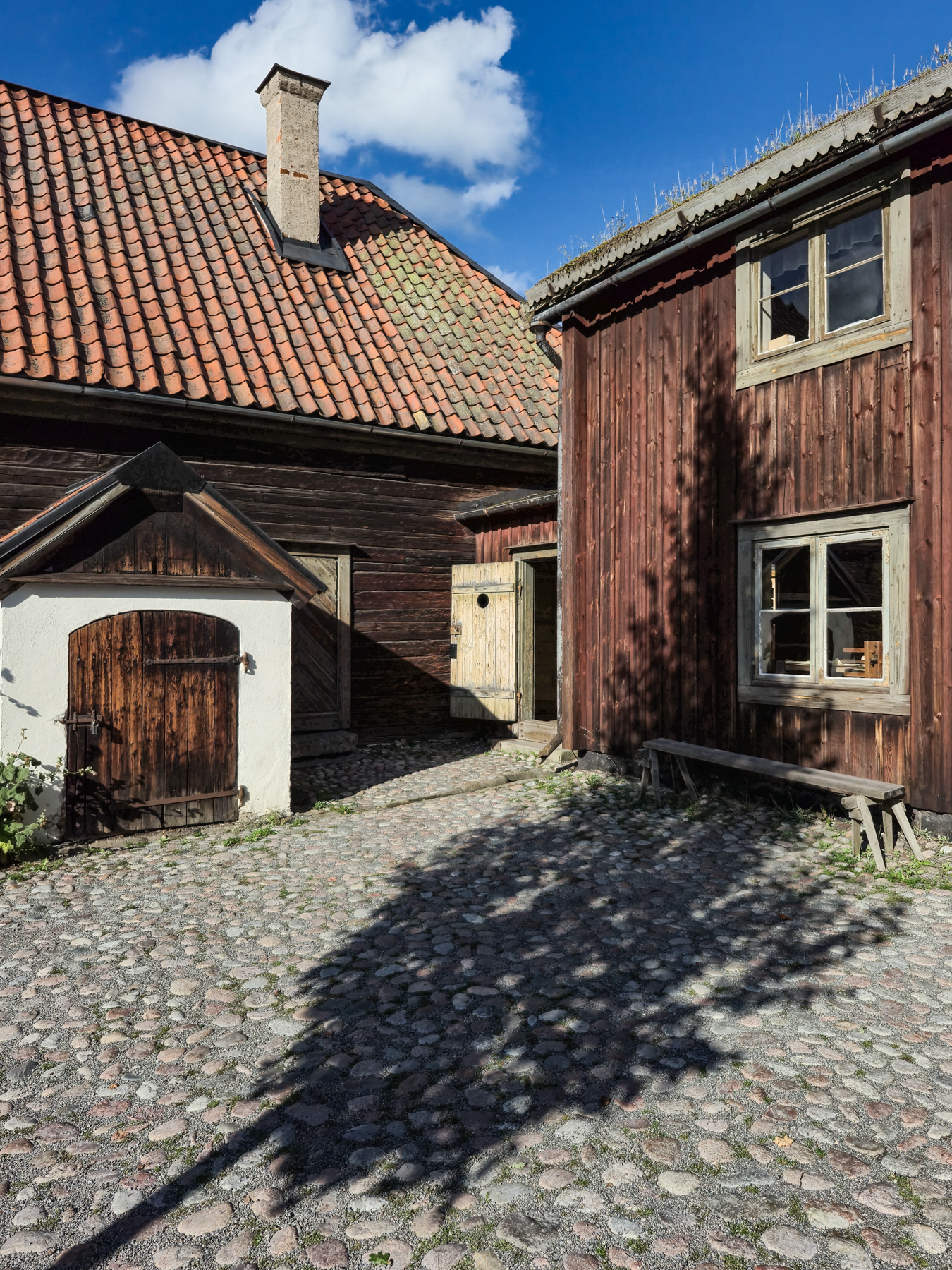 The book bindery and other artisan workshop homes.