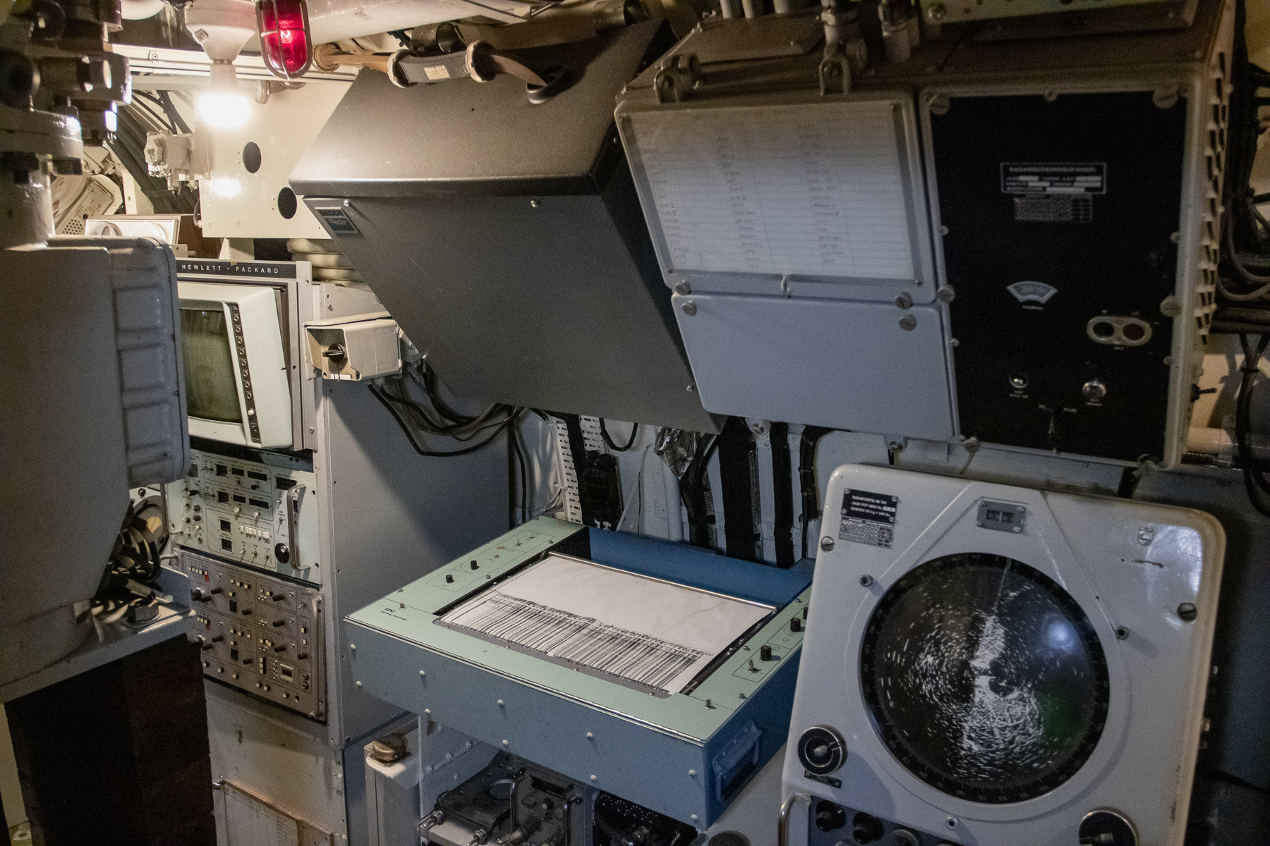 Plotter and radar systems inside the control room on board Tonijn.