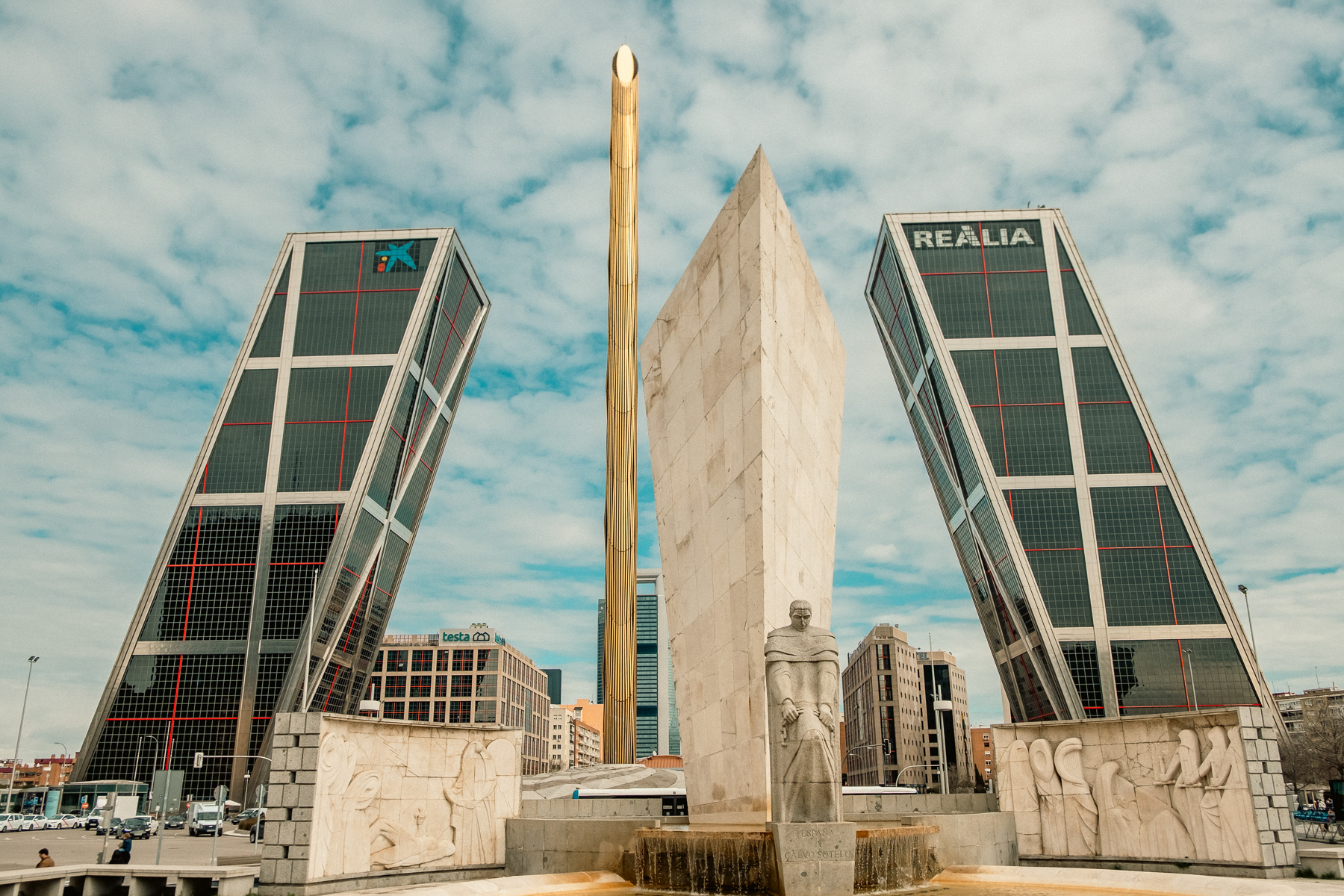 Plaza Castilla with the Realia towers, a giant gold-coloured needle and the monument for José Calvo Sotelo