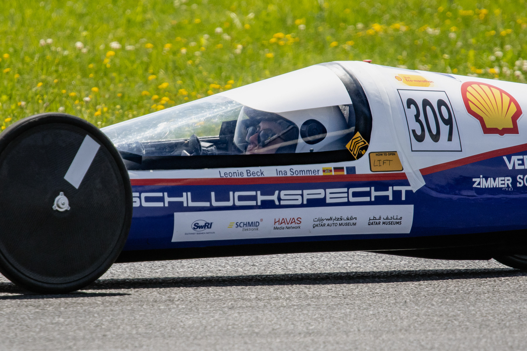 Close-up of a Germany prototype and its driver, while racing.