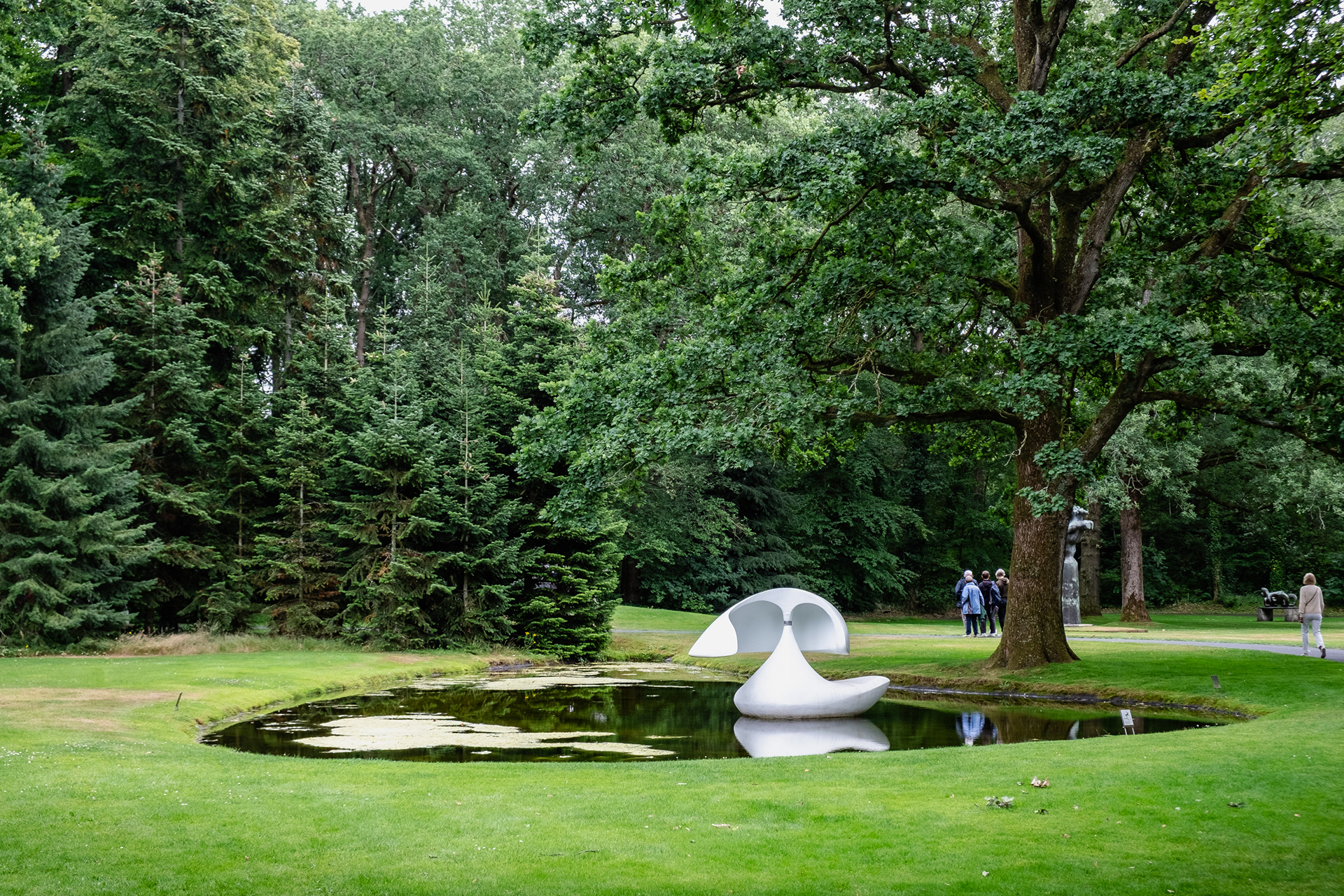 Artwork in a pond, inside the gardens of the Kröller-Müller Museum, July 2026.