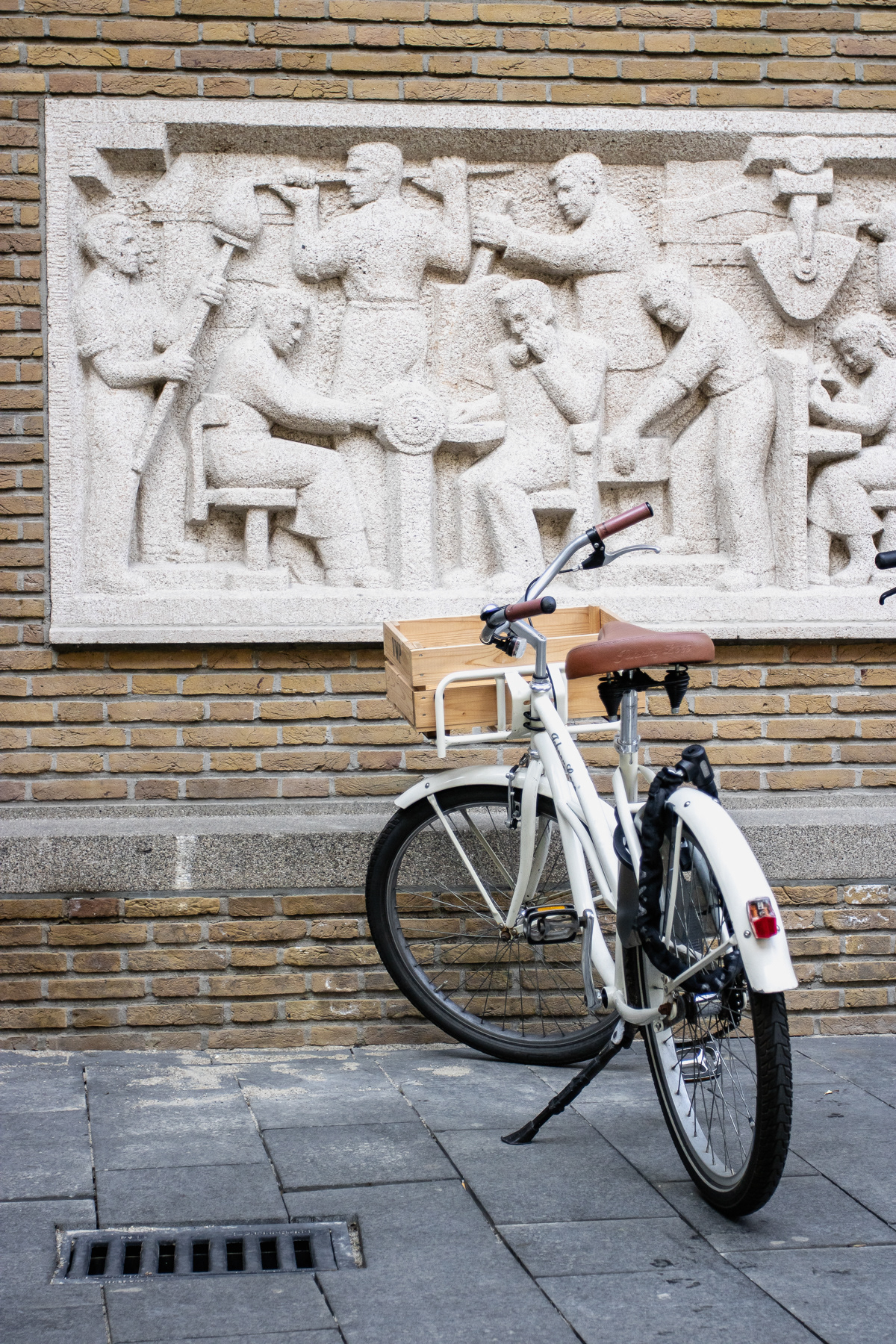A lone, white bicycle.