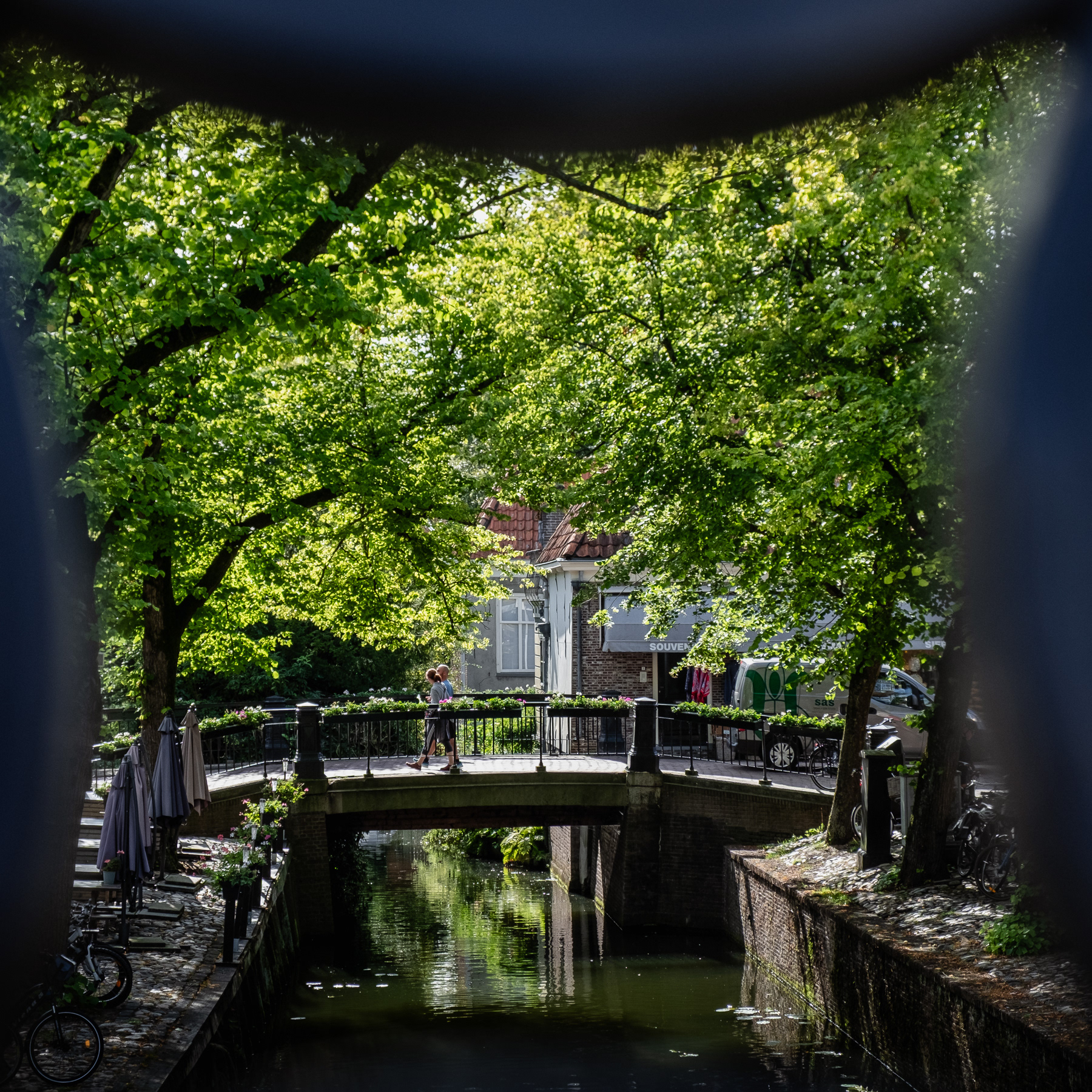 A central canal and bridge in Edam, August 2023.