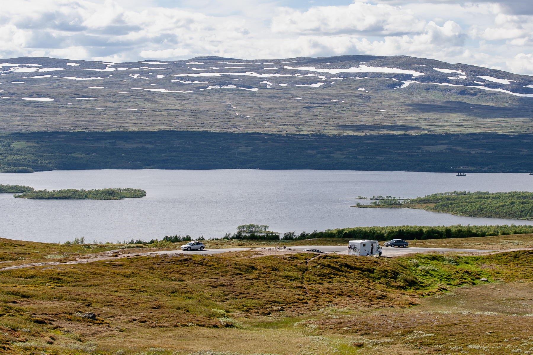 One of the stops on the way, small, less travelle. Even in July still snow in the landscape.