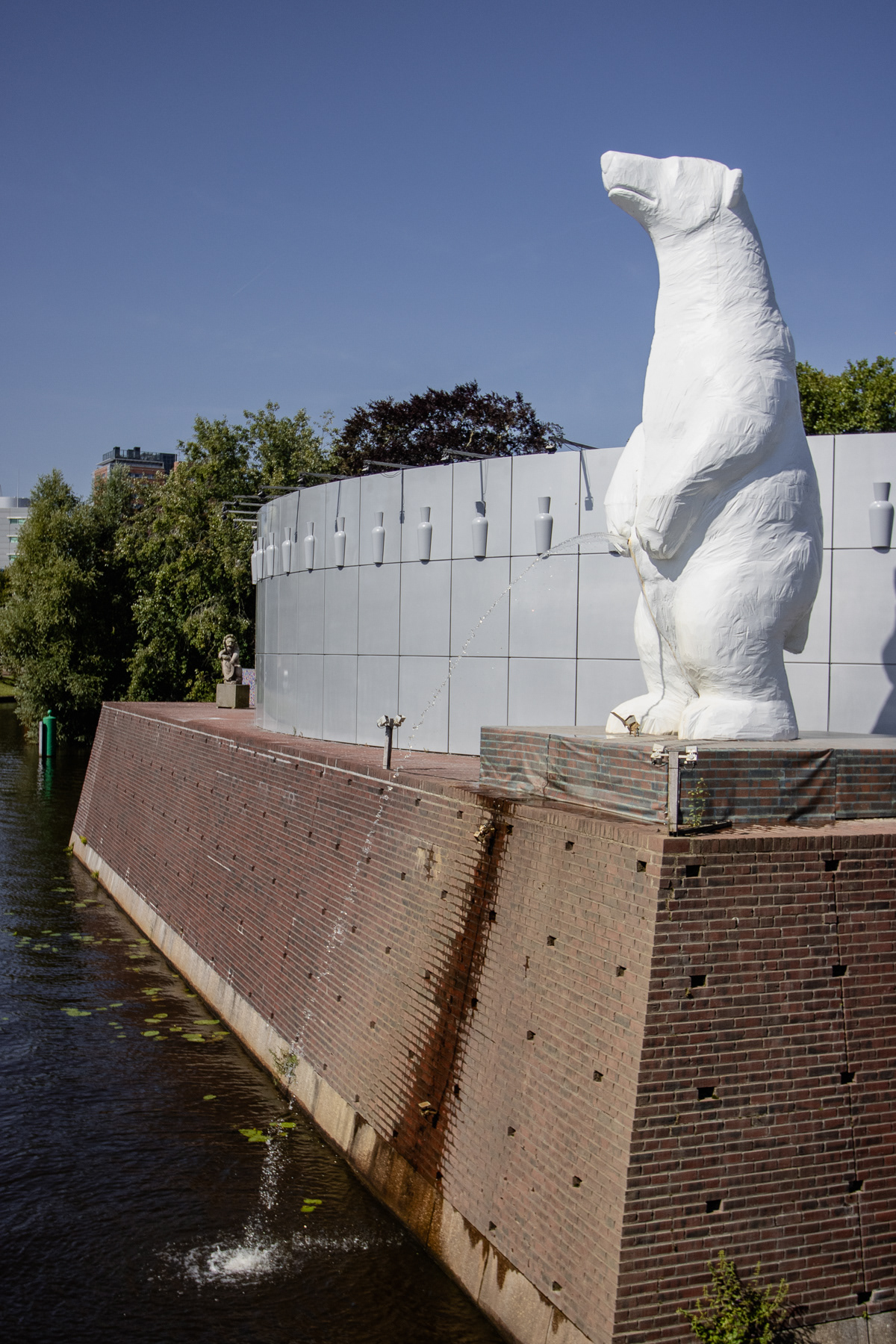The peeing polar bear is certainly seen.