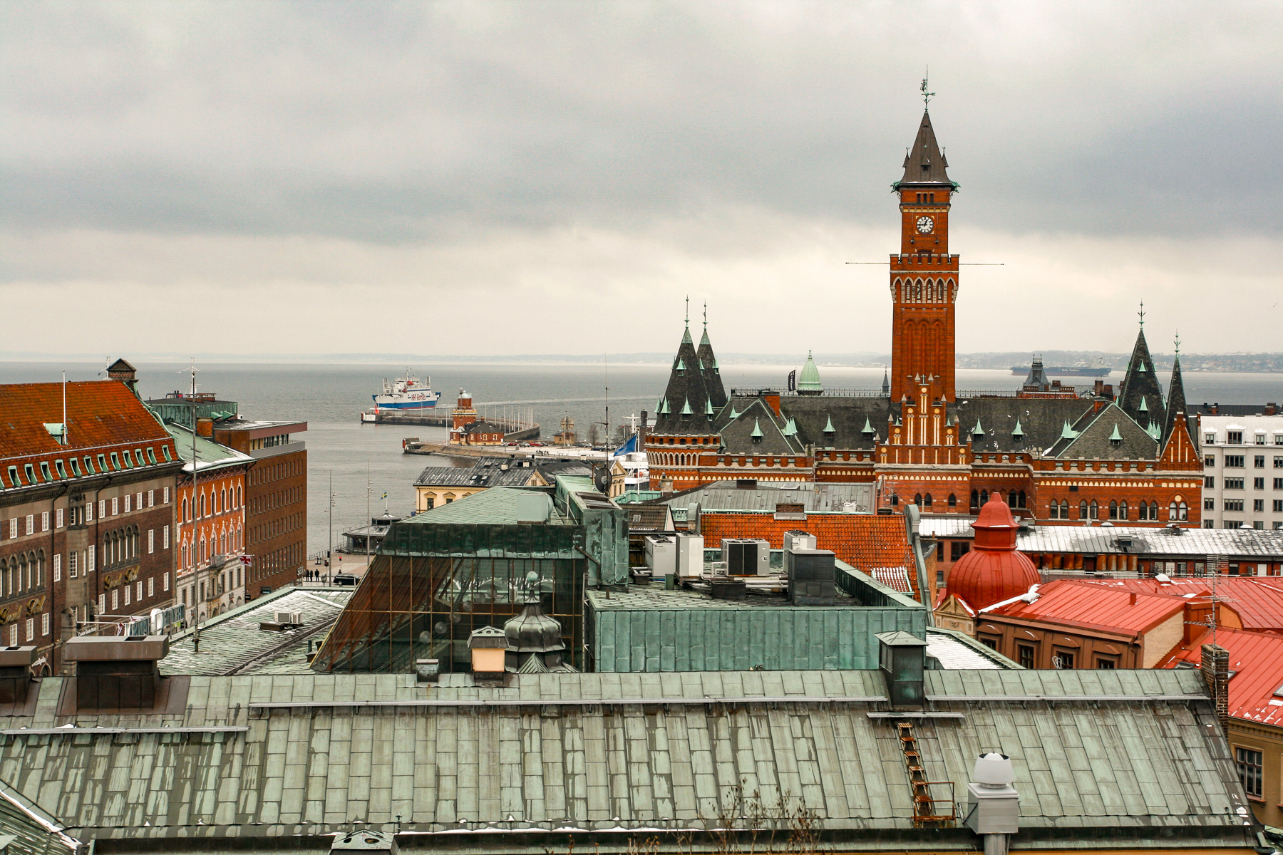 View on Helsingør and Denmark in the distance. Notice the ferry arriving from Denmark in Helsingborg, March 2011.