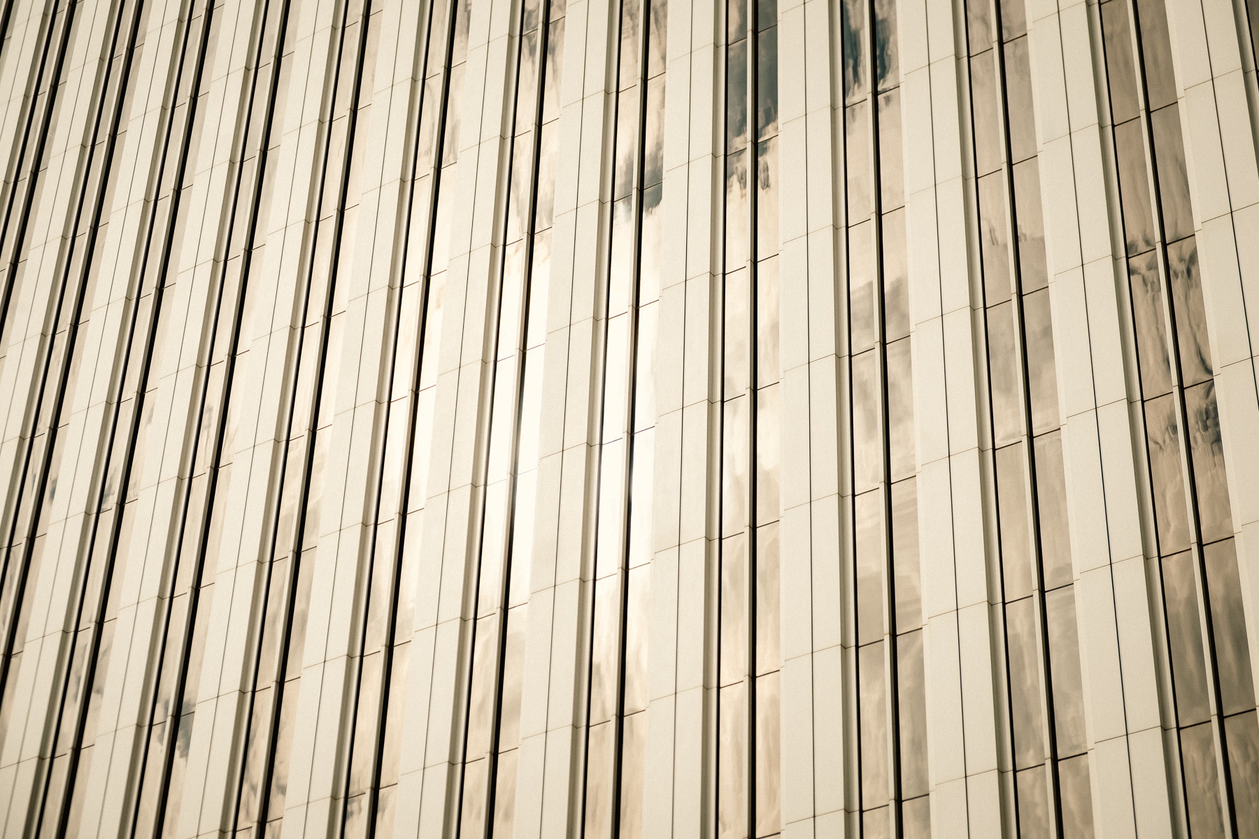 Detailed view of the aluminium and windows on the outside of the building.