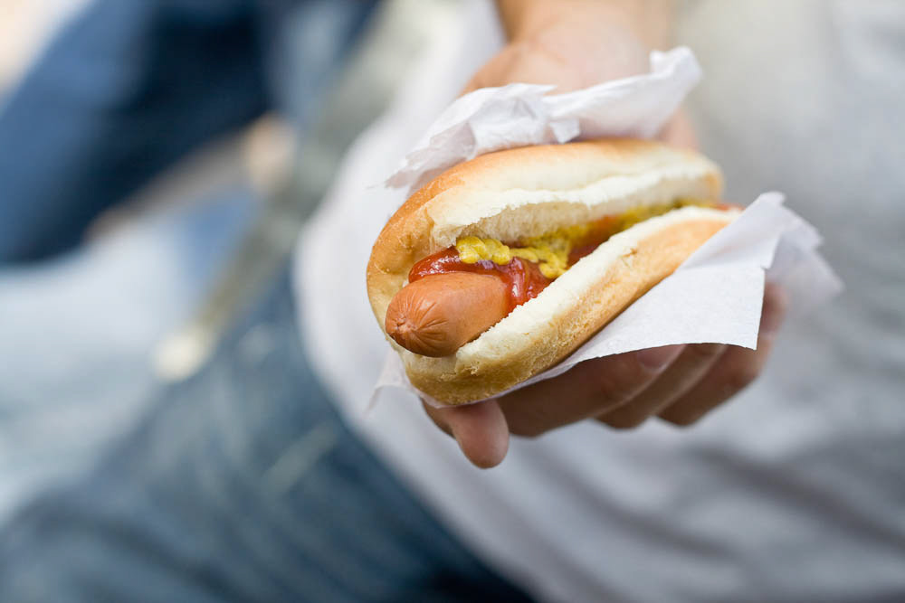 Close up shot of a hot dog. Horizontal shot.