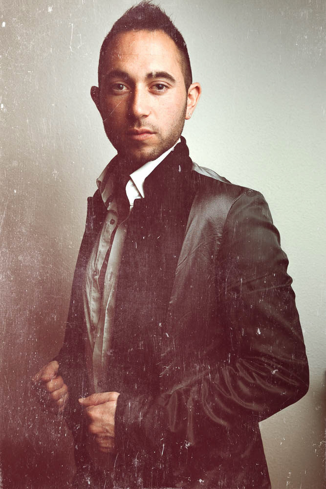 Portrait of a young beautiful man in jacket