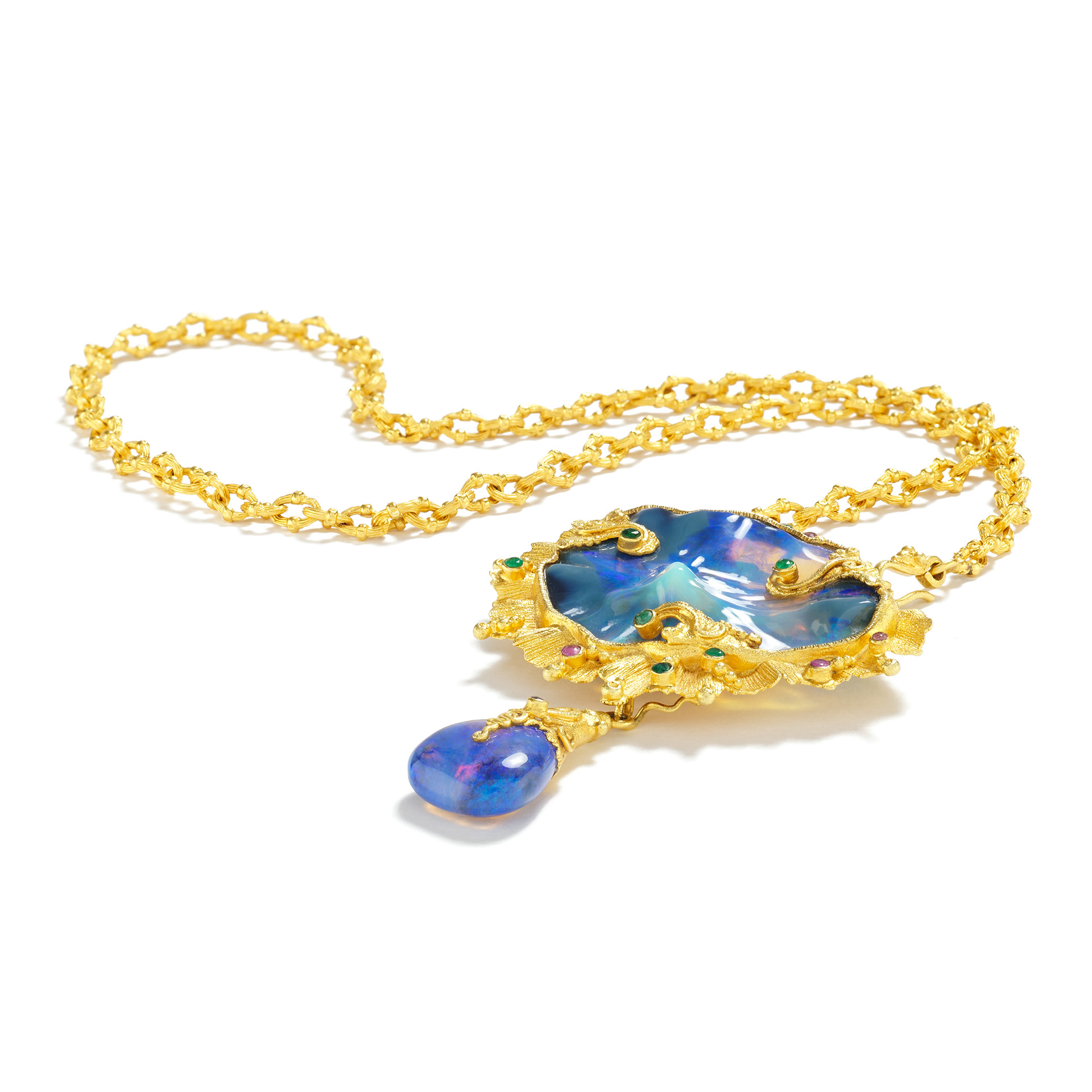carved precious opal reminiscent of set in a combination necklace/pendant hand crafted by Balinese goldsmiths in collaboration with Carolyn Tyler