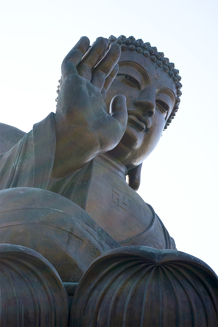 looking up at the bronze Tian Tan Buddha at the Po Lin Monastary in Hong Kong