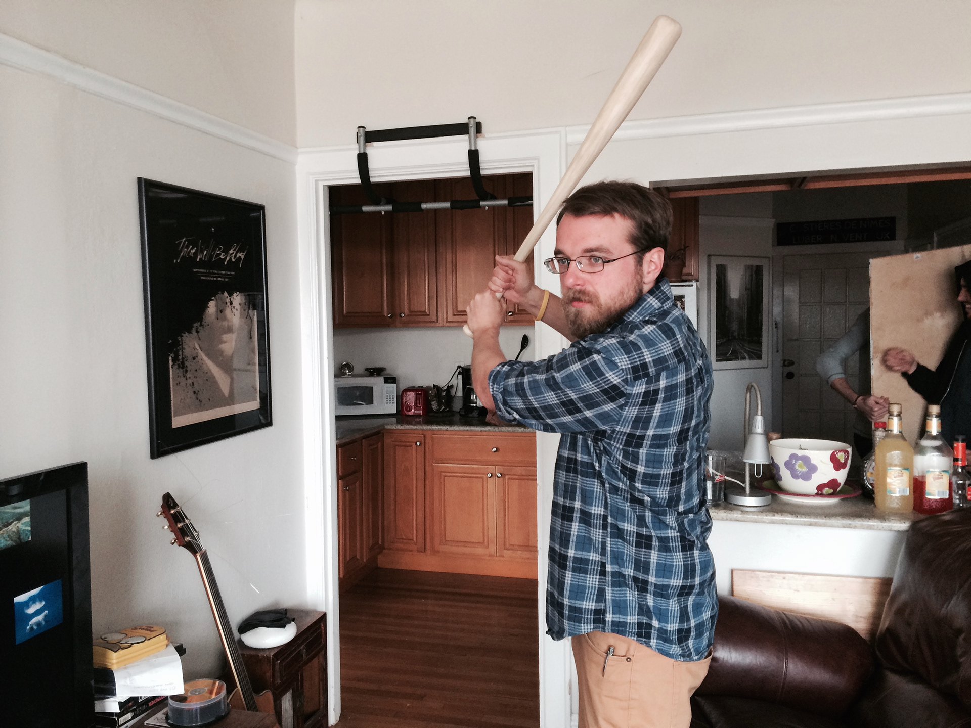 Brad distracts the Landlord while we flip the bathroom door