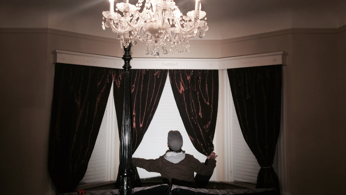 Hobson dresses the curtains