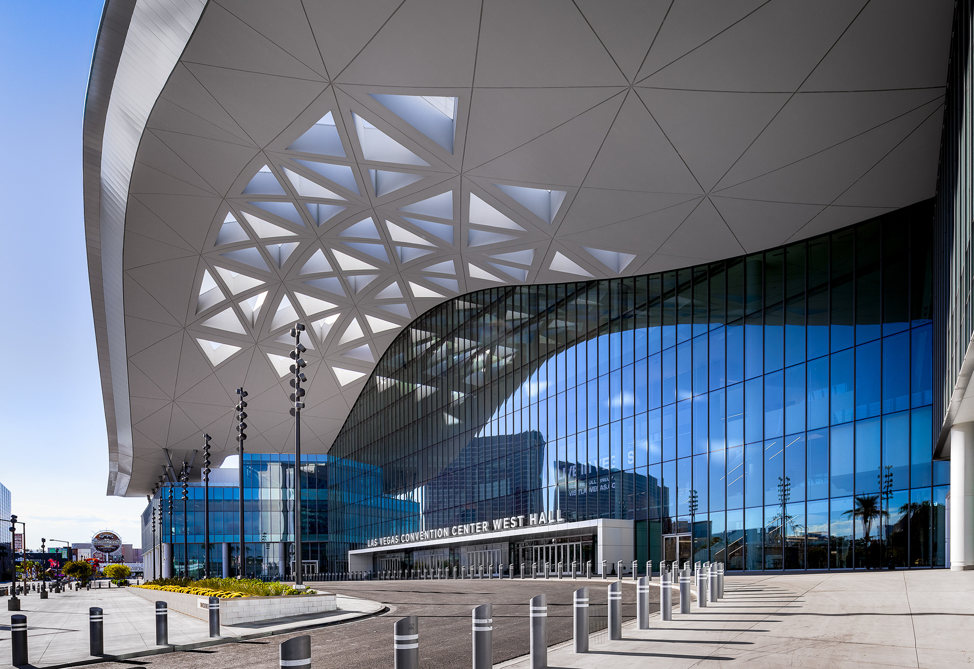 Las Vegas Convention Center West Hall — Grand Lobby entrance under the geometric canopy.