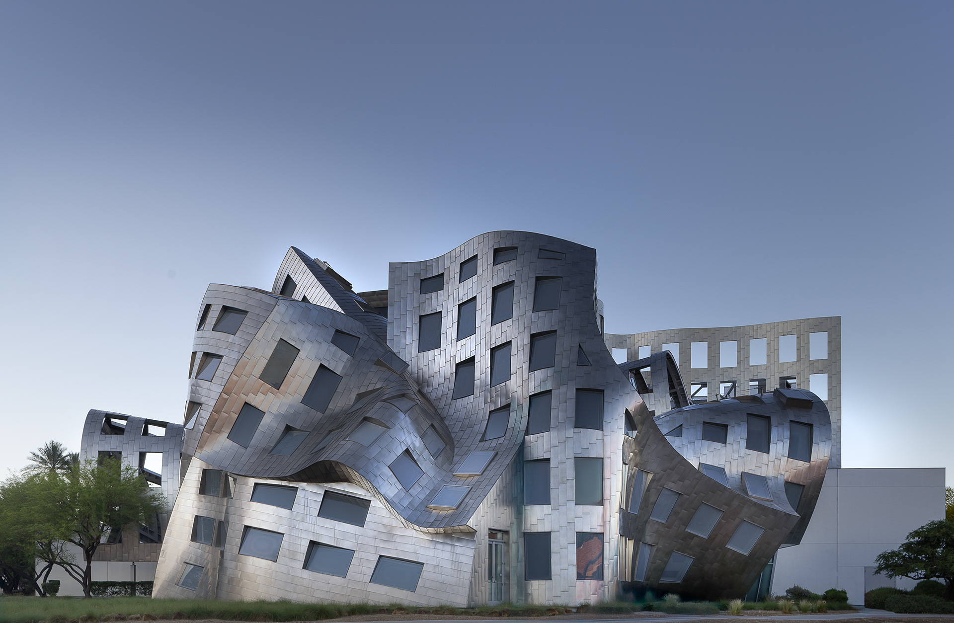 Exterior view of the Cleveland Clinic Lou Ruvo Center for Brain Health in Las Vegas Nevada showing the sculptural stainless steel architecture designed by Frank Gehry.