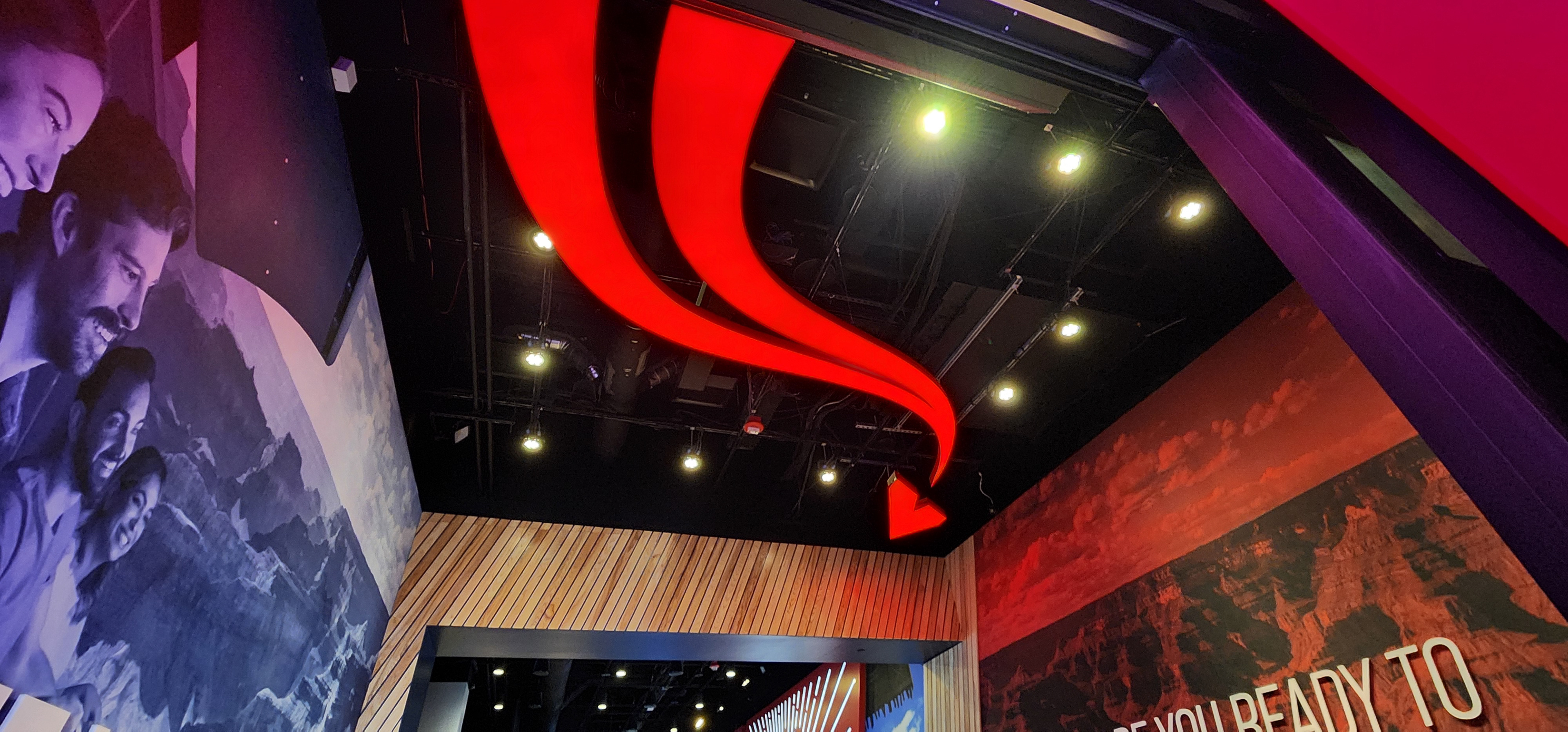 Illuminated ceiling arrow