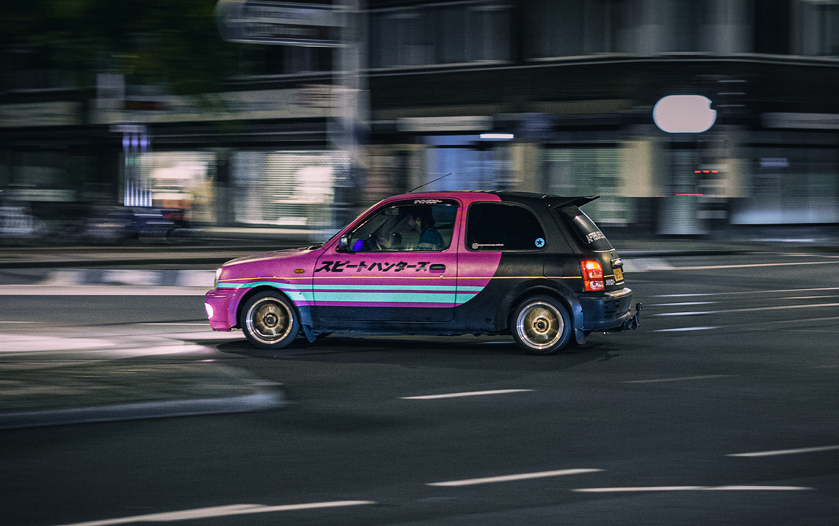 A fast little hatchback captured at night