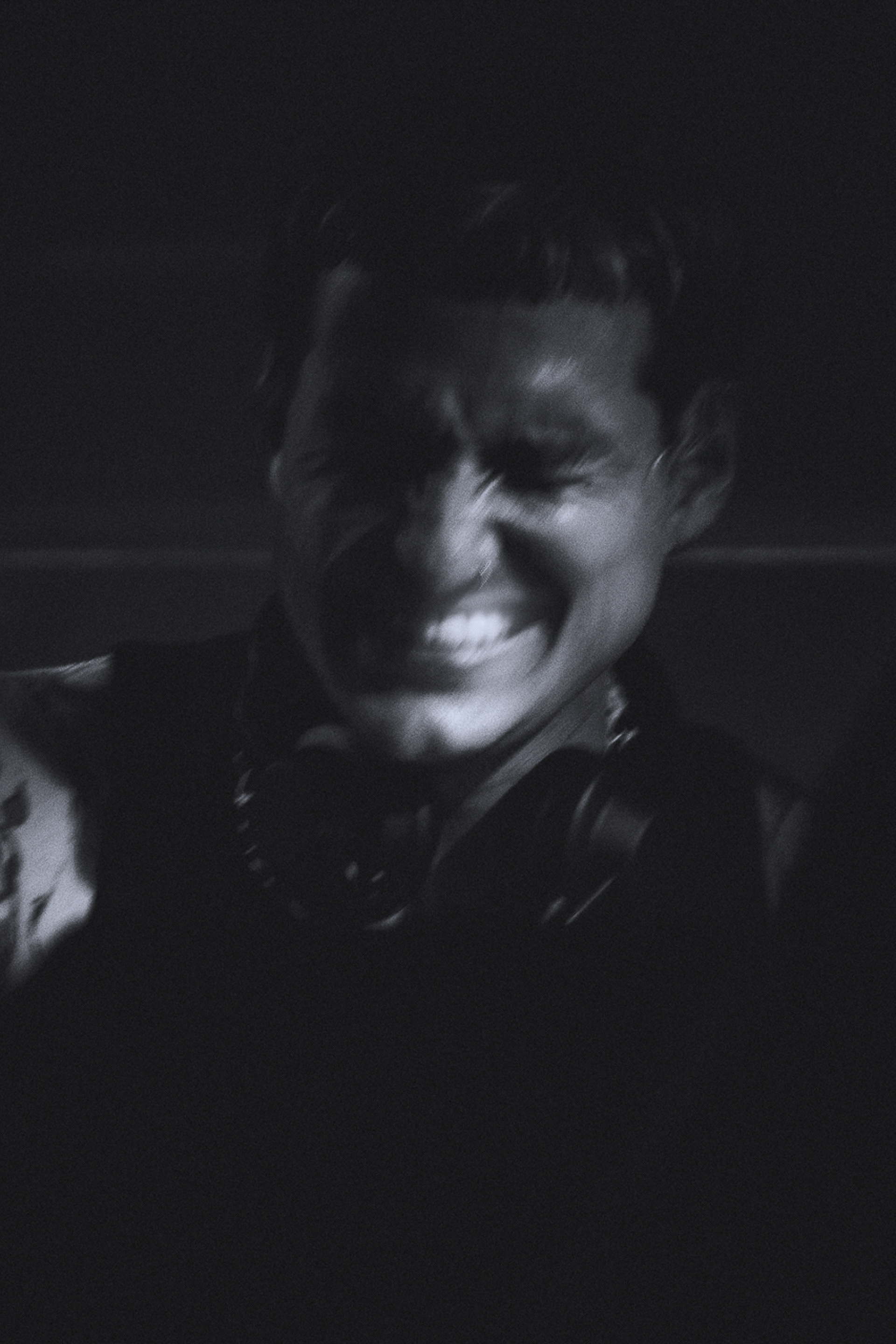 Intense black and white portrait of DJ NobodyListen performing at Zeny Vino Funk festival / Surový čiernobiely portrét DJa NobodyListen počas vystúpenia na festivale Ženy Víno Funk.