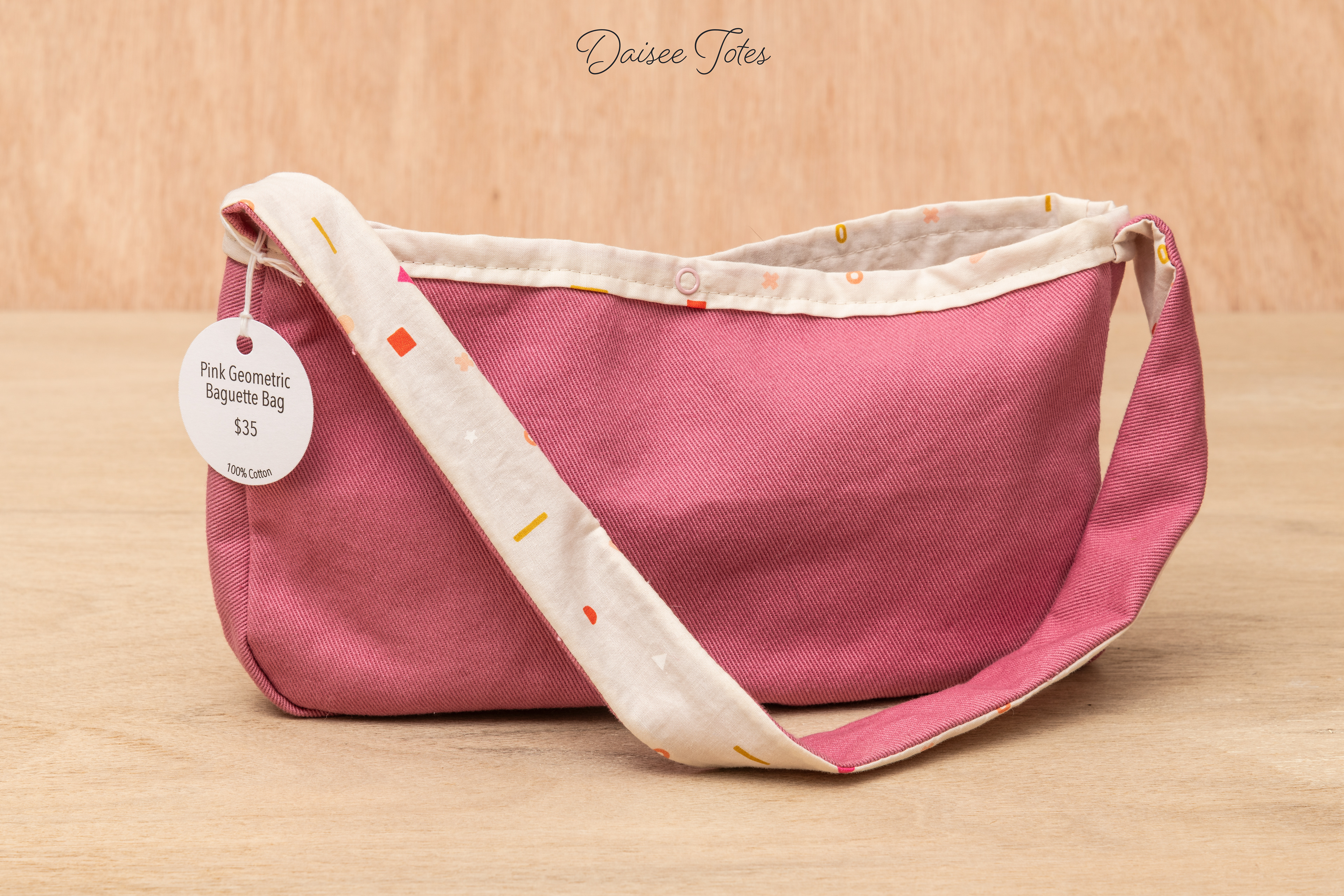 Pink Geometric Baguette Bag $35