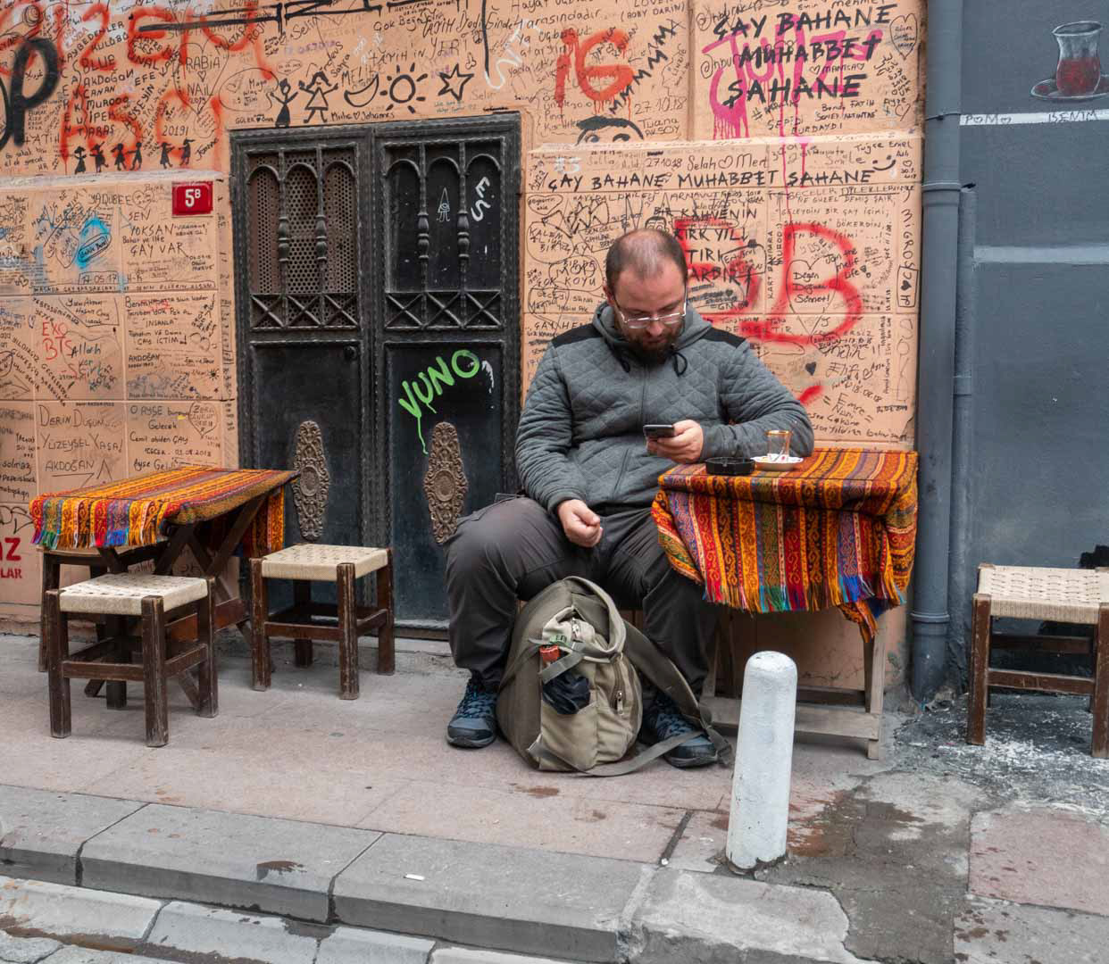 Checking his phone