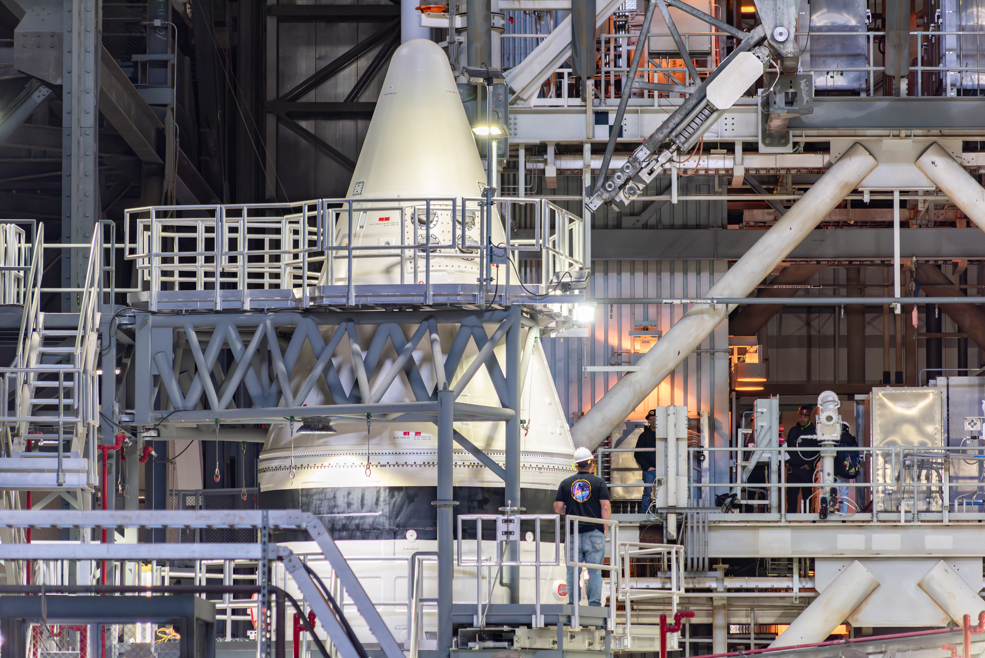 March 2025- An employee is seen working on the left SRB of SLS.