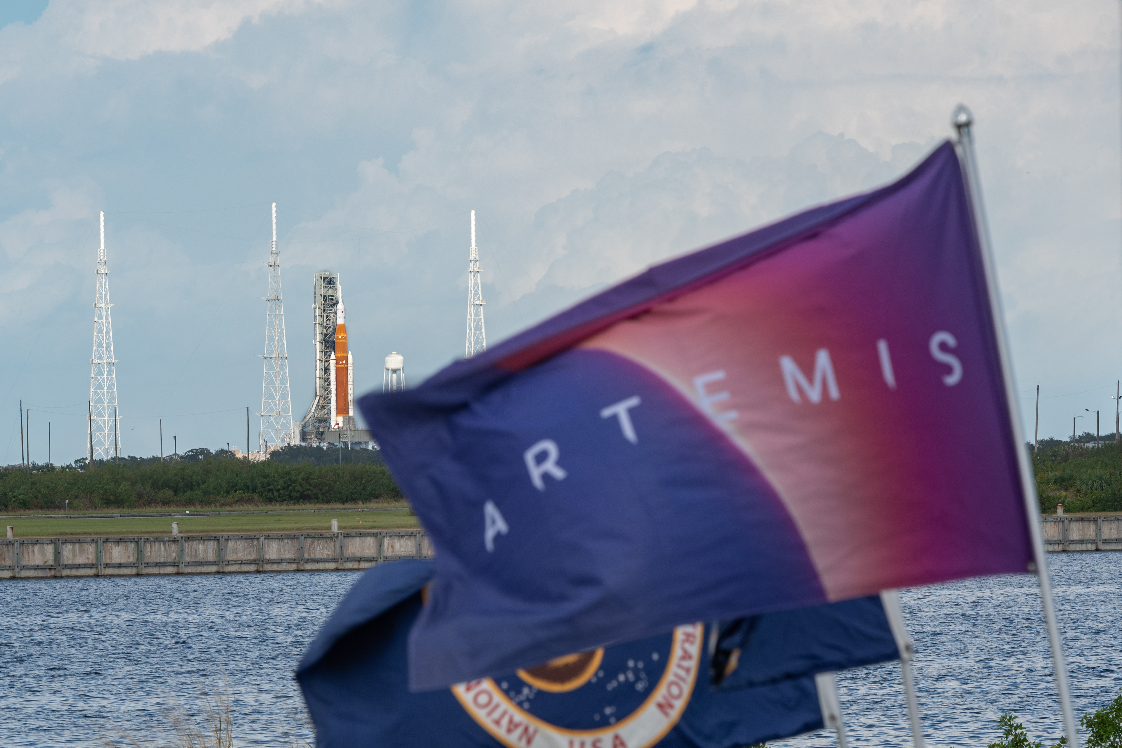An Artemis flag is seen blowing in the wind at NASA's LC-39 Press Site on November 14th, 2022.