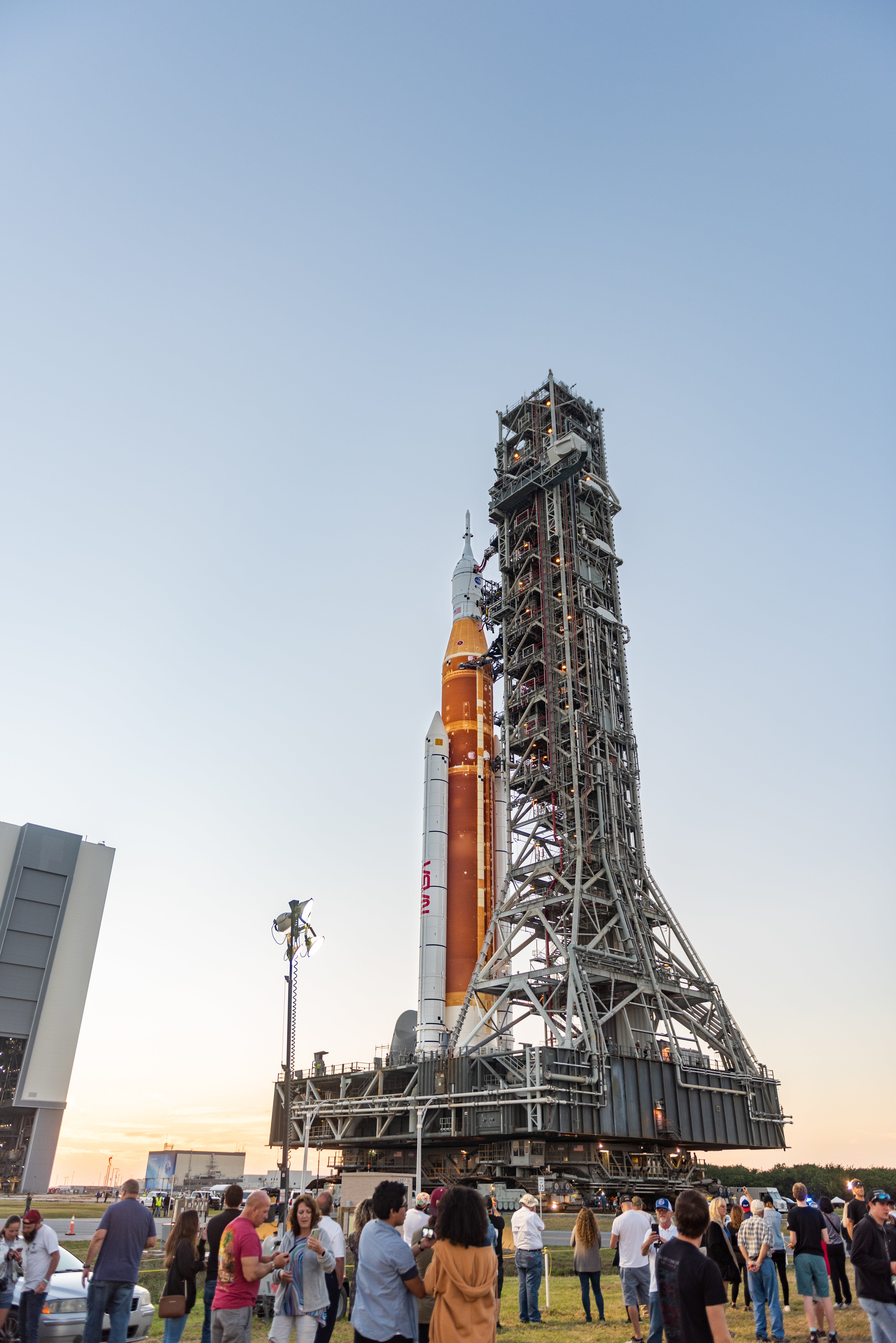 March 2022- NASA employees and contractors watch as SLS is rolled out of the Vehicle Assembly Building for the first time.