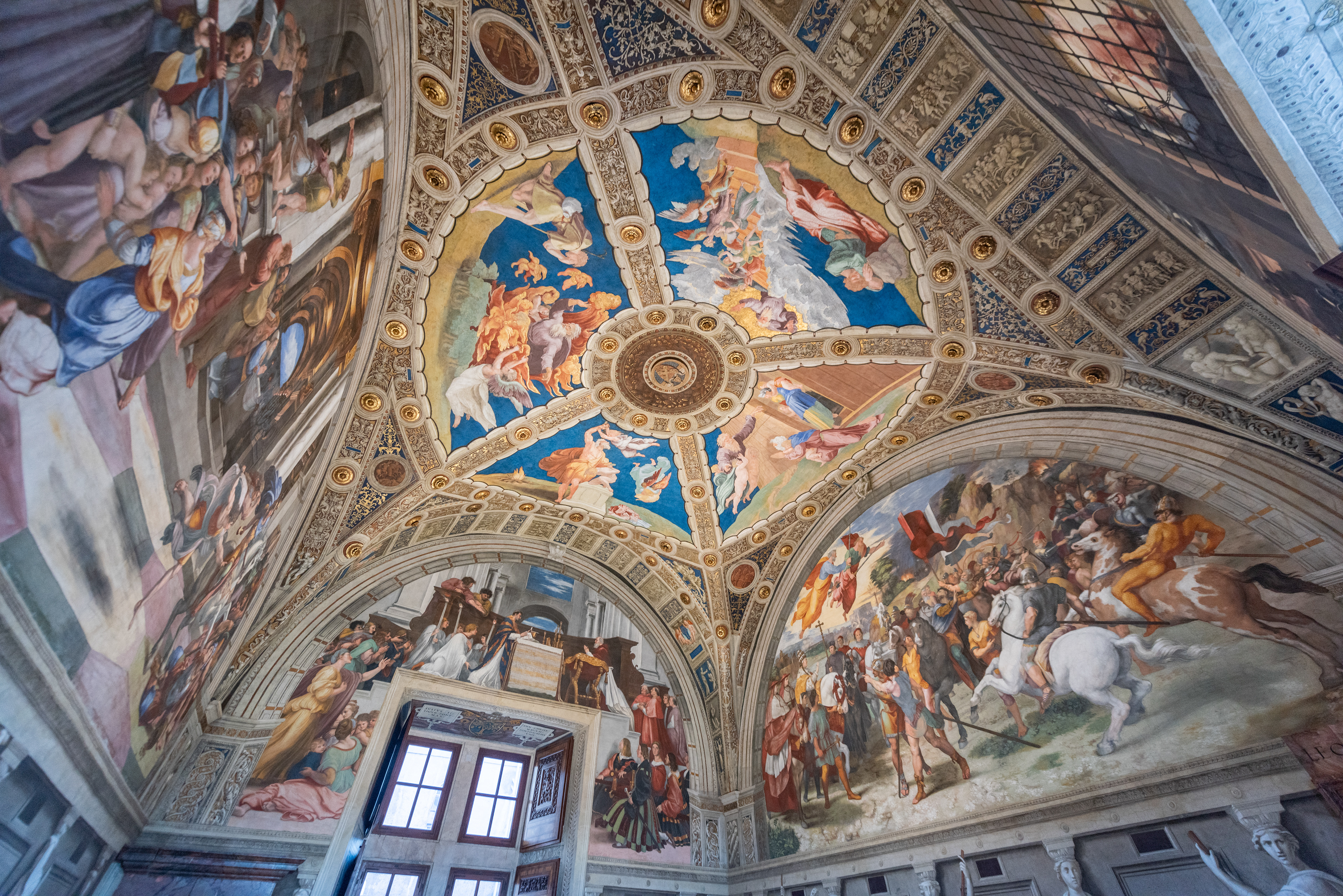Some of the thousands of artwork lining the the halls and ceilings of the Vatican Museum